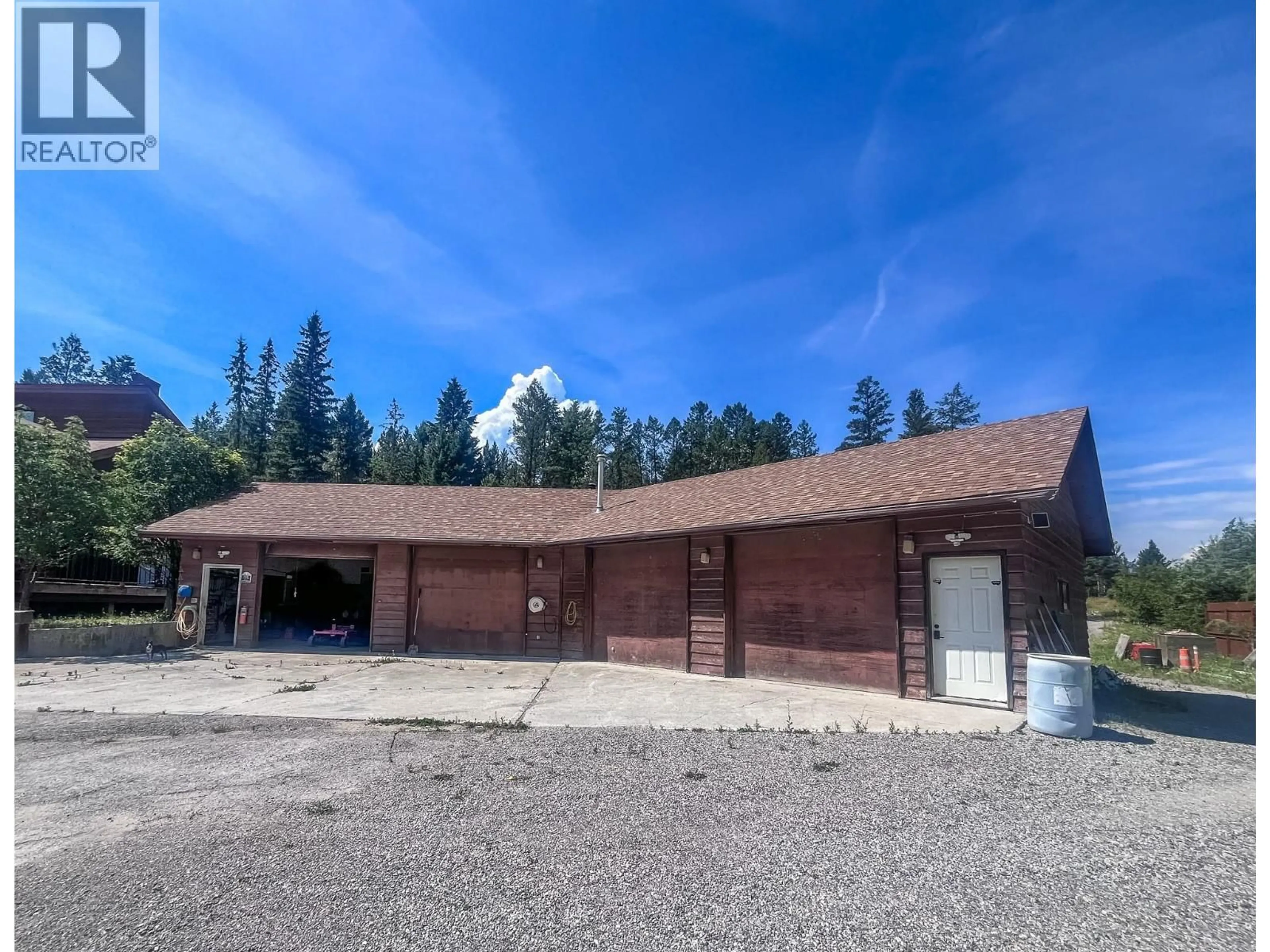 A pic from outside/outdoor area/front of a property/back of a property/a pic from drone, building for 1049 SWANSEA ROAD, Invermere British Columbia V0A1K3