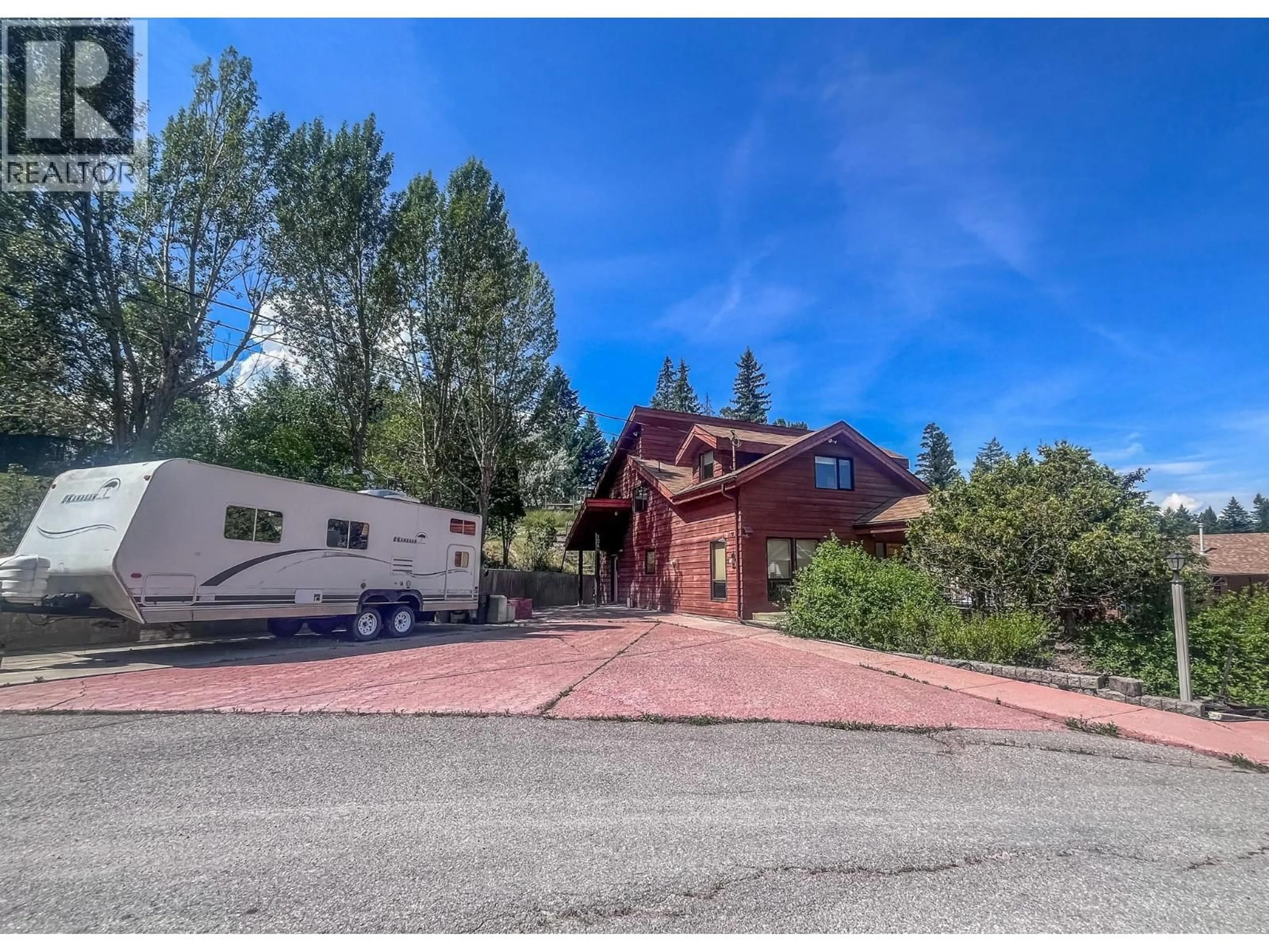 A pic from outside/outdoor area/front of a property/back of a property/a pic from drone, mountain view for 1049 SWANSEA ROAD, Invermere British Columbia V0A1K3