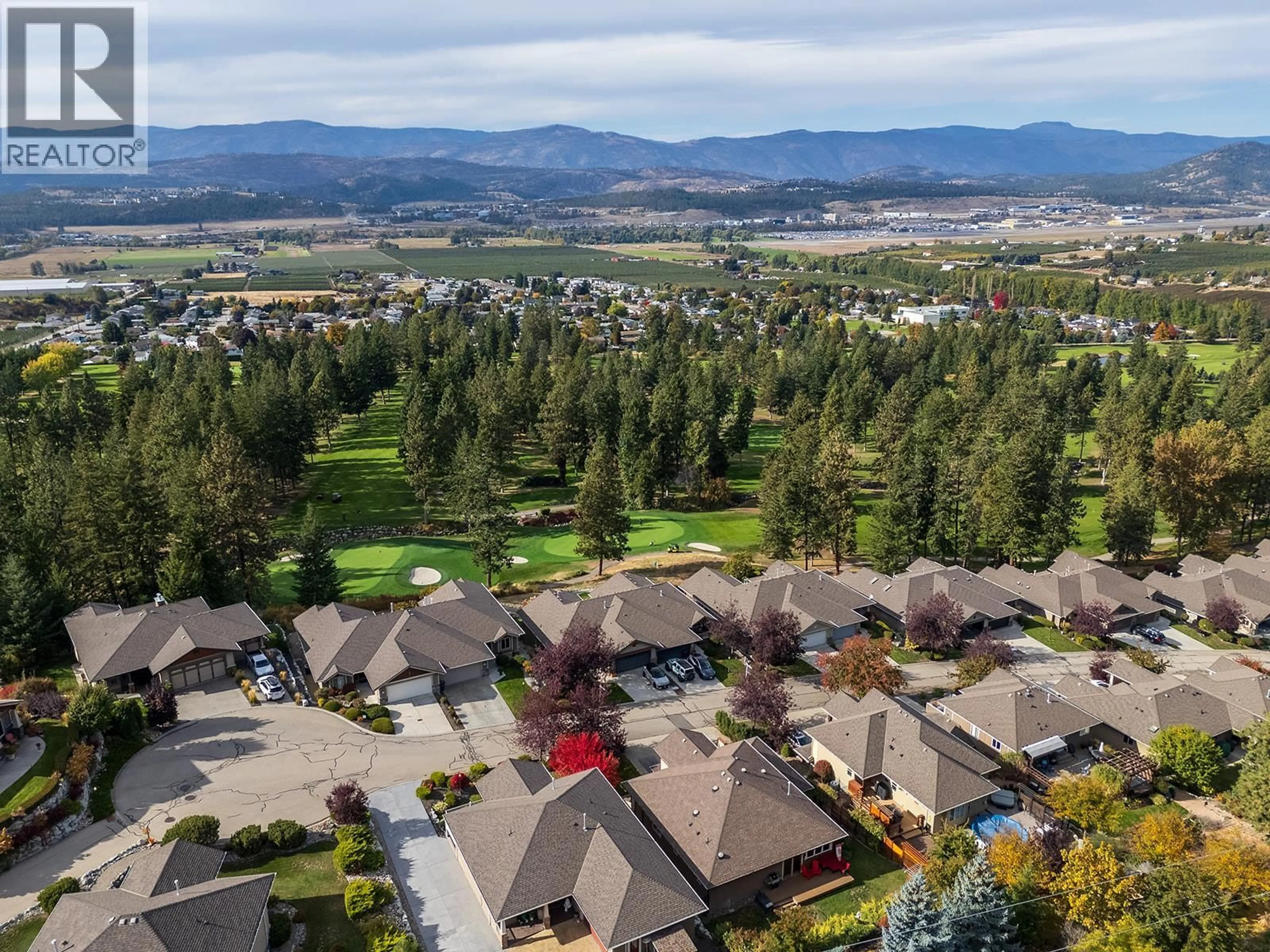 A pic from outside/outdoor area/front of a property/back of a property/a pic from drone, mountain view for 3431 CAMELBACK DRIVE, Kelowna British Columbia V1Z8A8