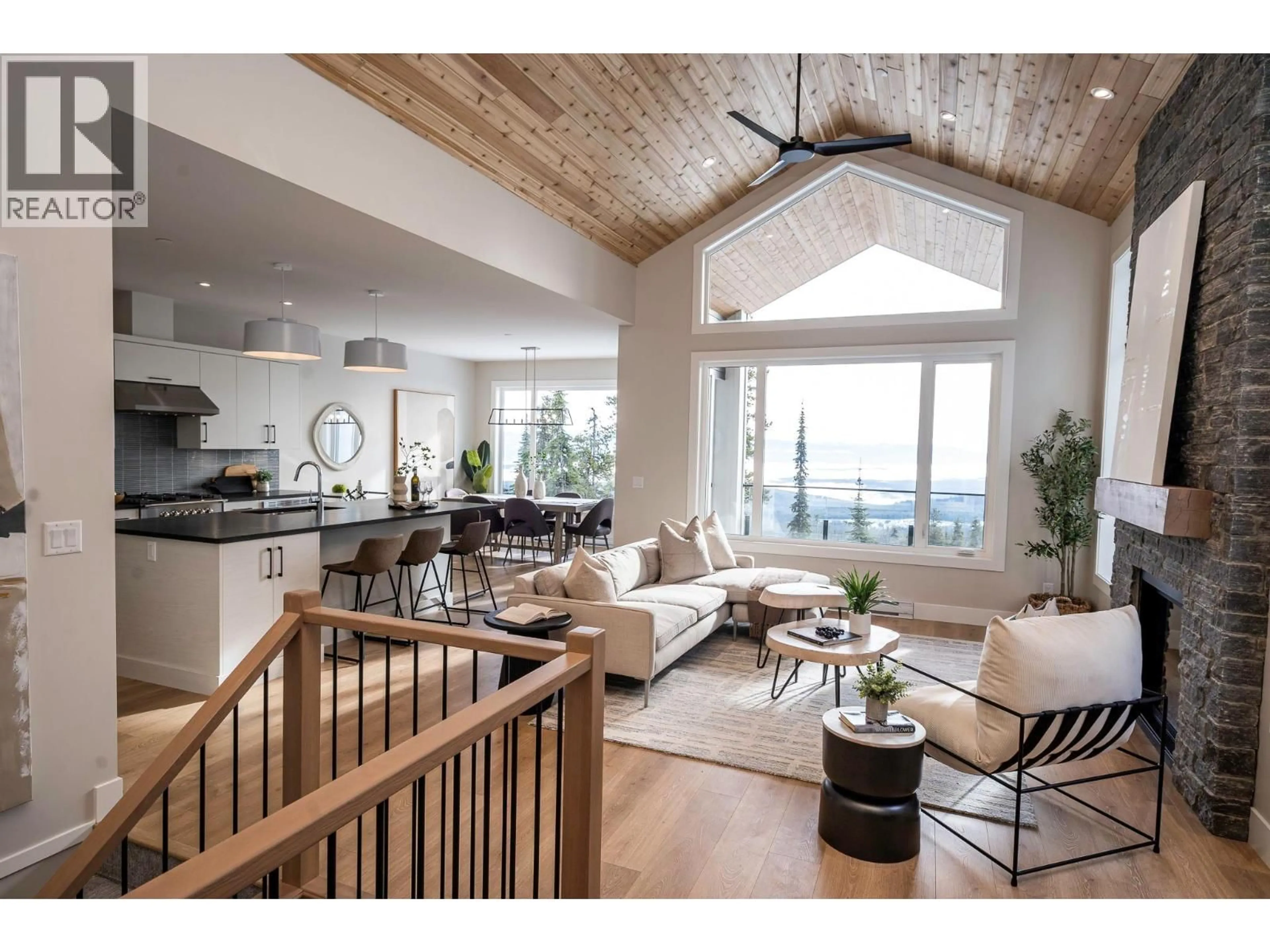 Open concept kitchen, wood/laminate floor for 215A GRIZZLY RIDGE TRAIL, Big White British Columbia V1P1P4