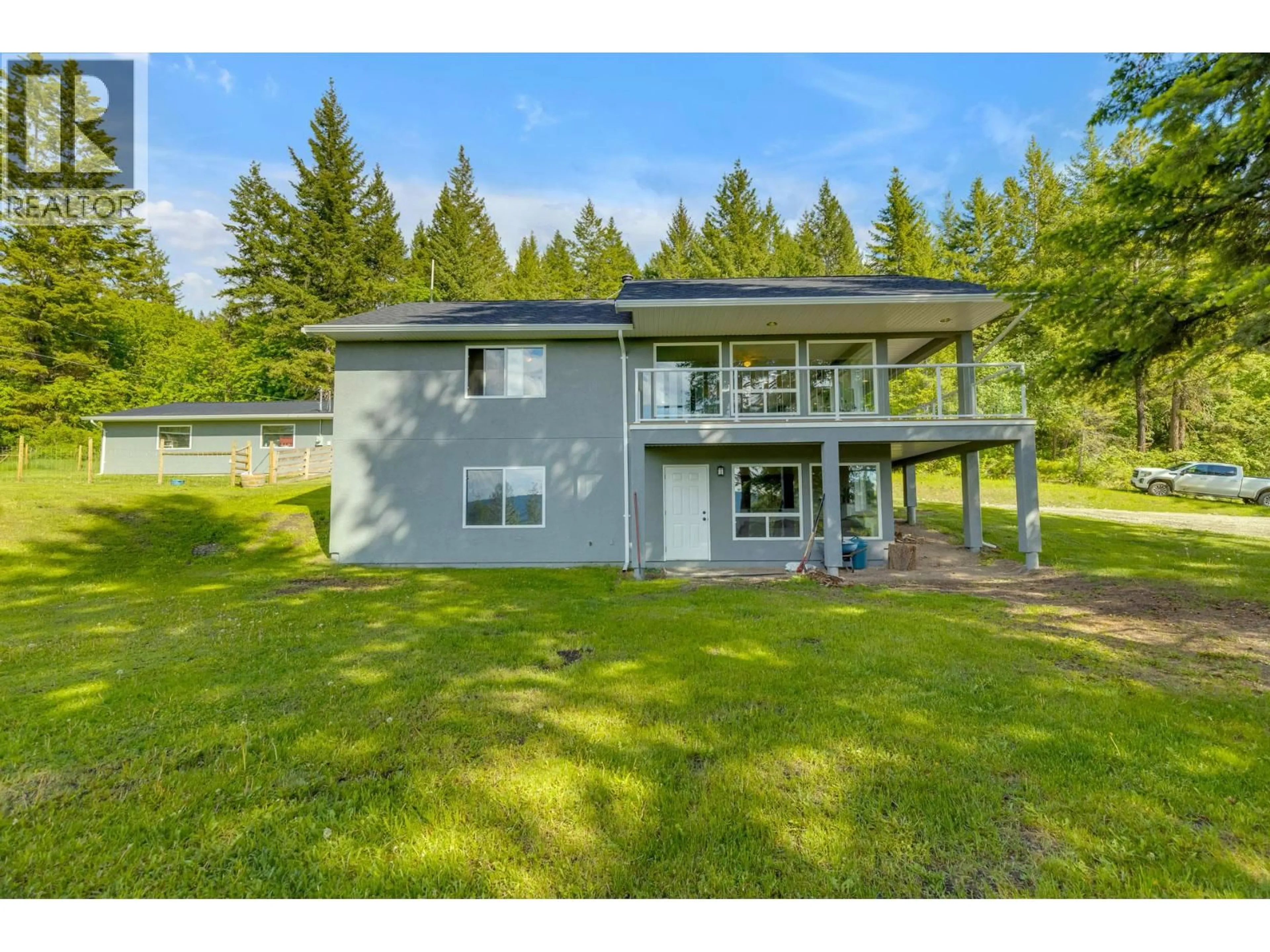 A pic from outside/outdoor area/front of a property/back of a property/a pic from drone, water/lake/river/ocean view for 6011 OYAMA LAKE ROAD, Lake Country British Columbia V4V2C9