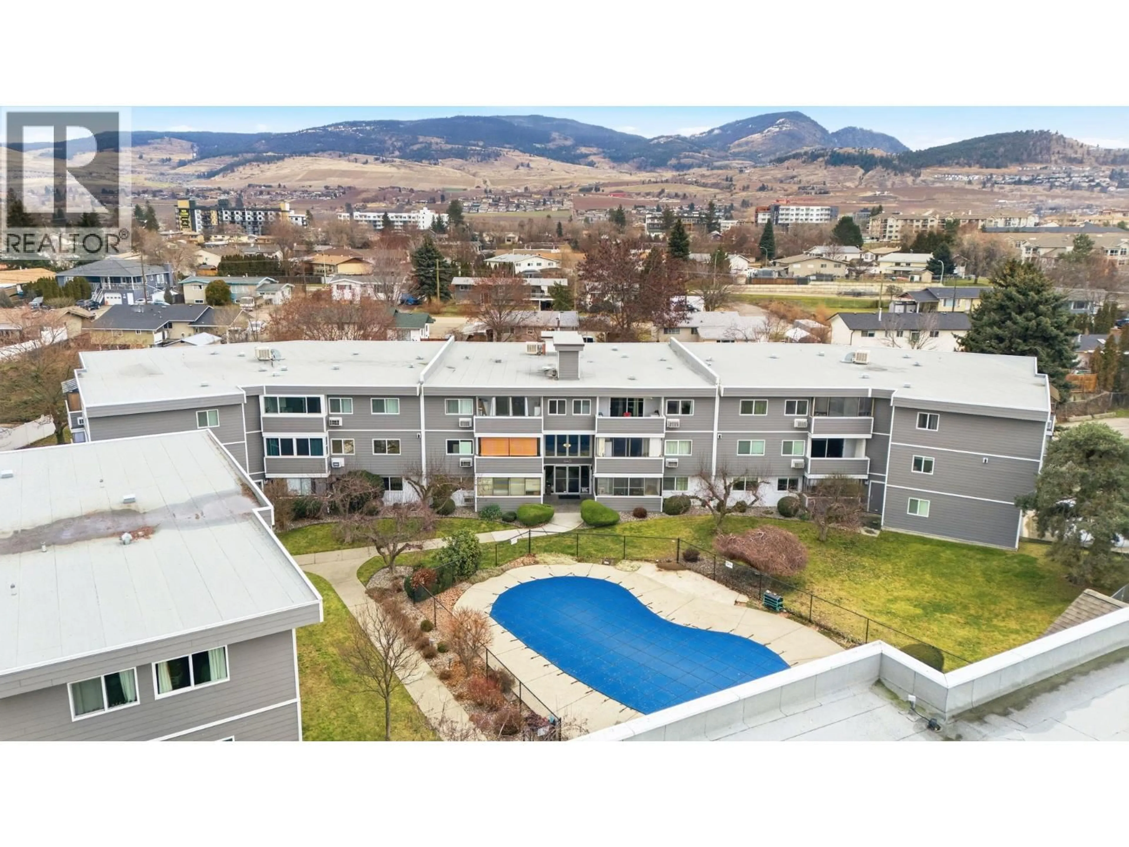 A pic from outside/outdoor area/front of a property/back of a property/a pic from drone, mountain view for 207 - 445 ALL STAR COURT, Kelowna British Columbia V1X5N7