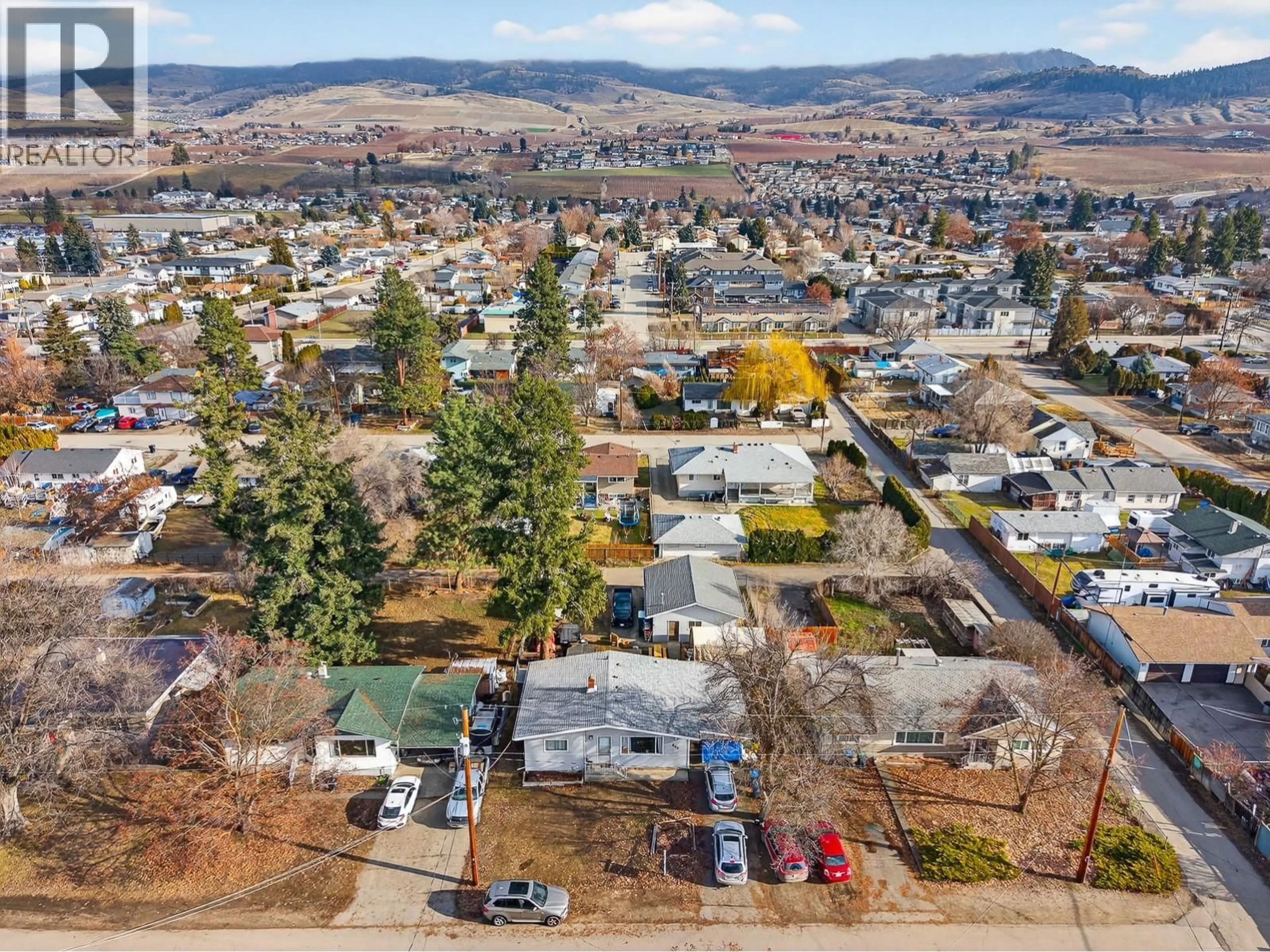 A pic from outside/outdoor area/front of a property/back of a property/a pic from drone, mountain view for 495 DONHAUSER ROAD, Kelowna British Columbia V1X3G2