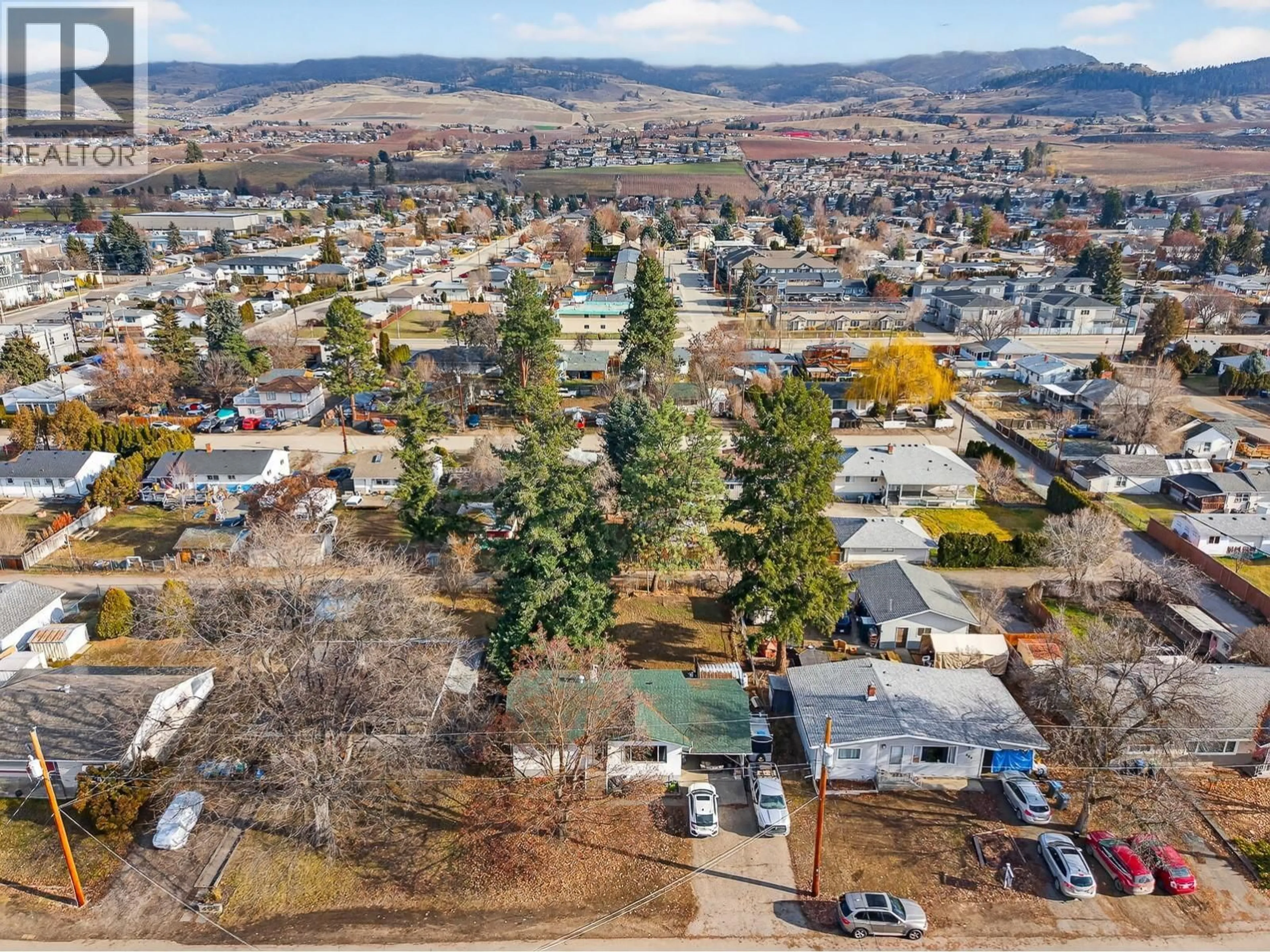 A pic from outside/outdoor area/front of a property/back of a property/a pic from drone, mountain view for 495 DONHAUSER ROAD, Kelowna British Columbia V1X3G2