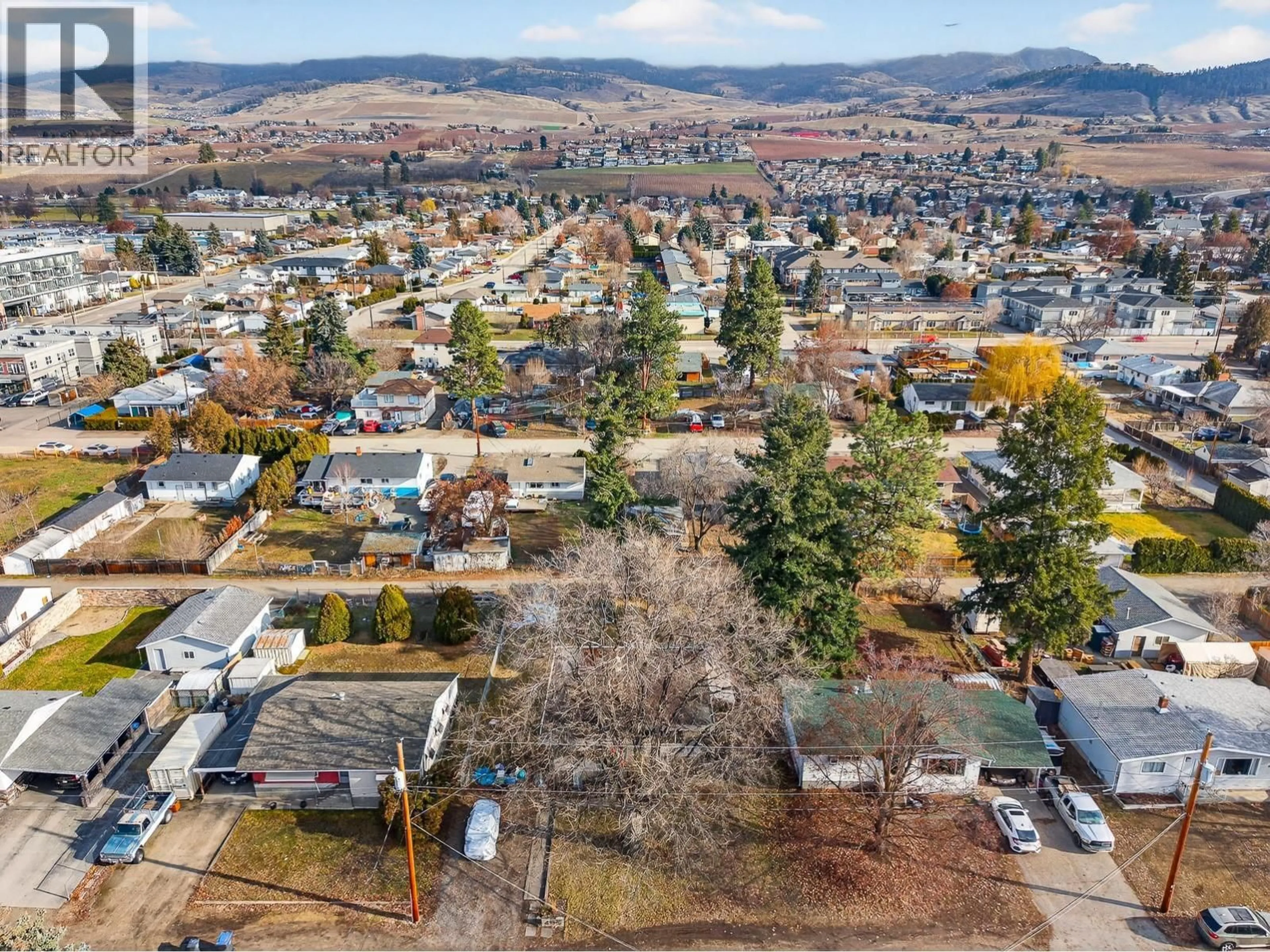 A pic from outside/outdoor area/front of a property/back of a property/a pic from drone, mountain view for 495 DONHAUSER ROAD, Kelowna British Columbia V1X3G2