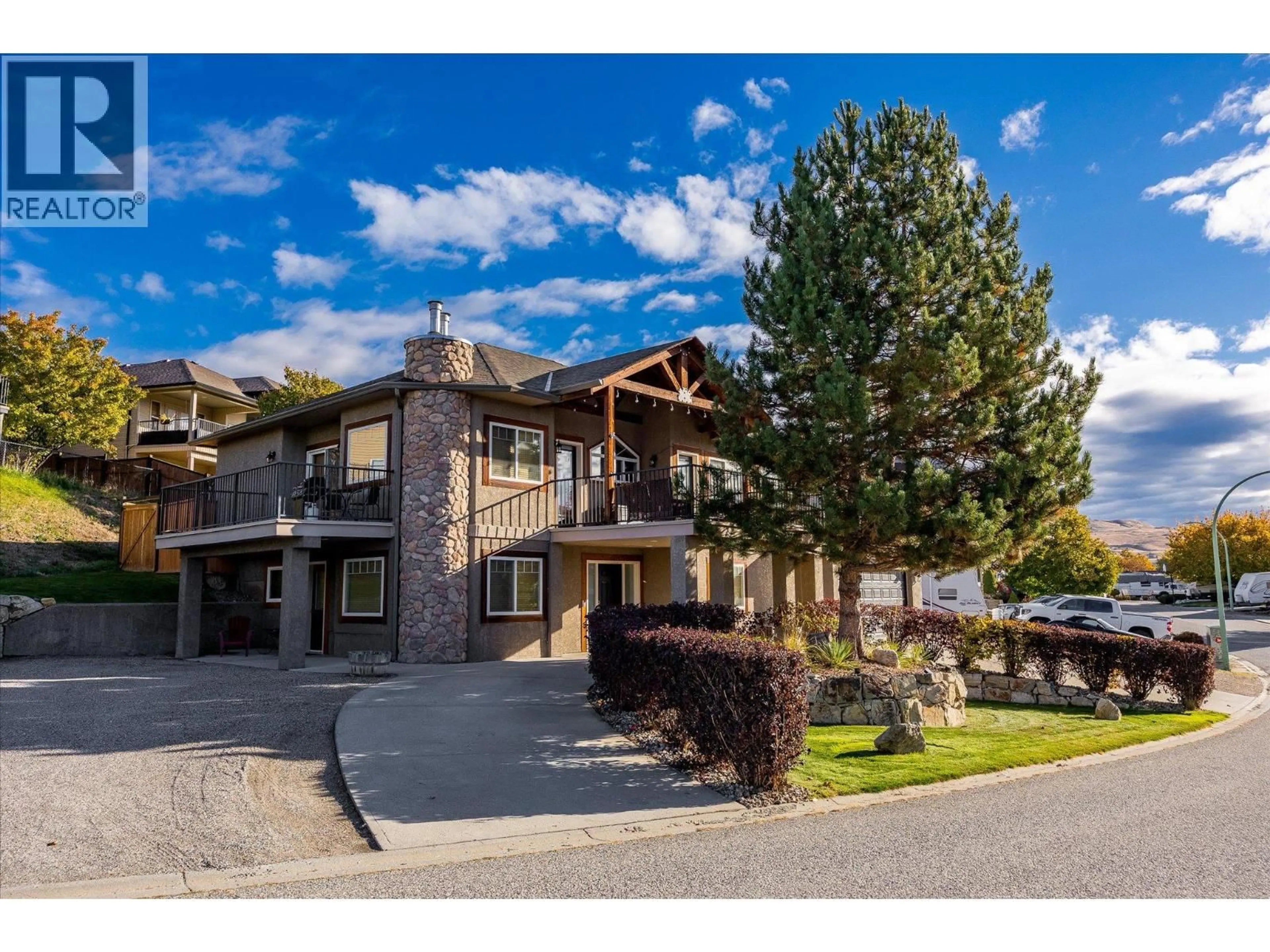 A pic from outside/outdoor area/front of a property/back of a property/a pic from drone, mountain view for 1536 WILMOT AVENUE, Kelowna British Columbia v1p1n3