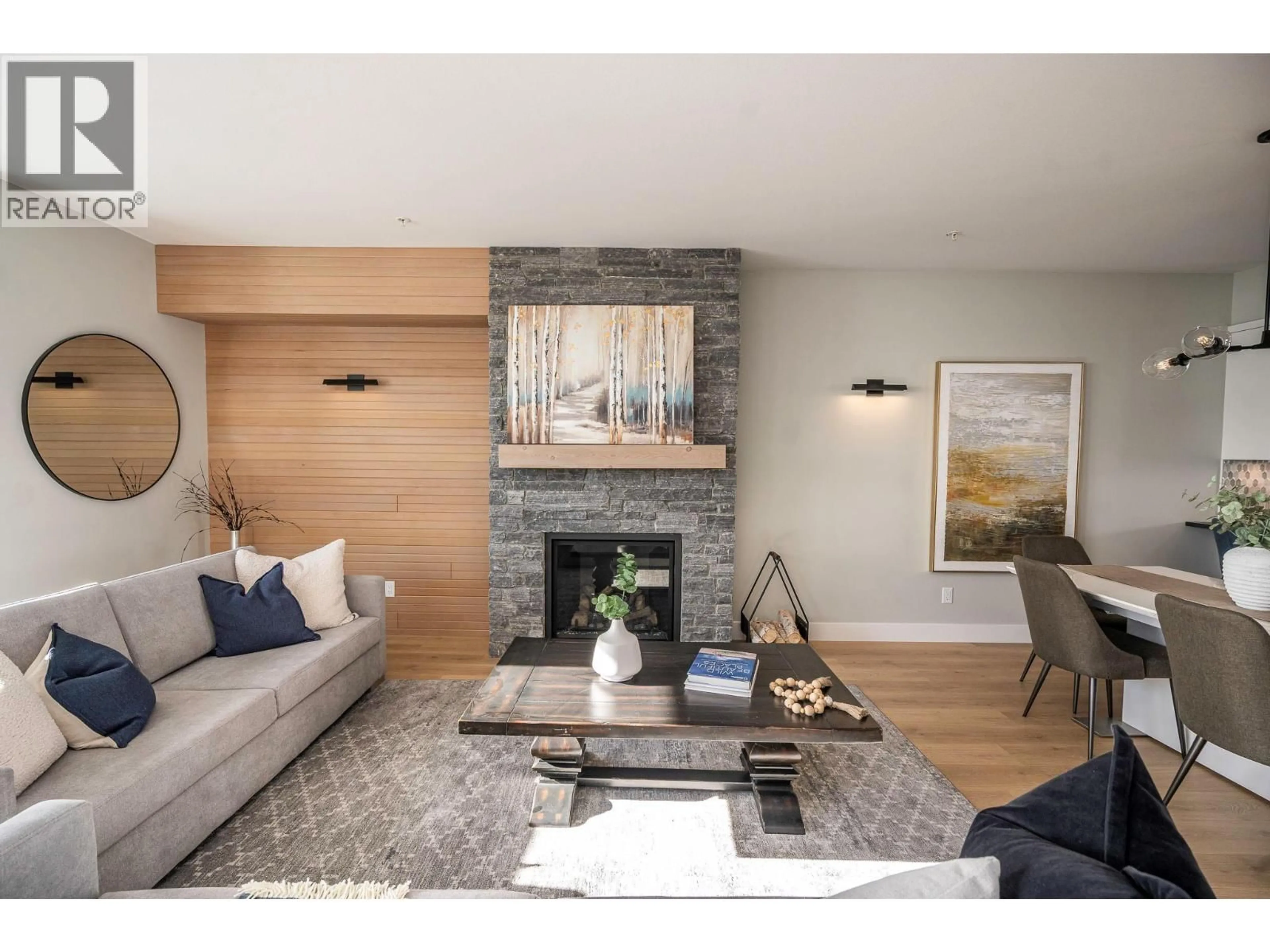 Living room with furniture, wood/laminate floor for 270A GRIZZLY RIDGE TRAIL, Big White British Columbia V1P1P4