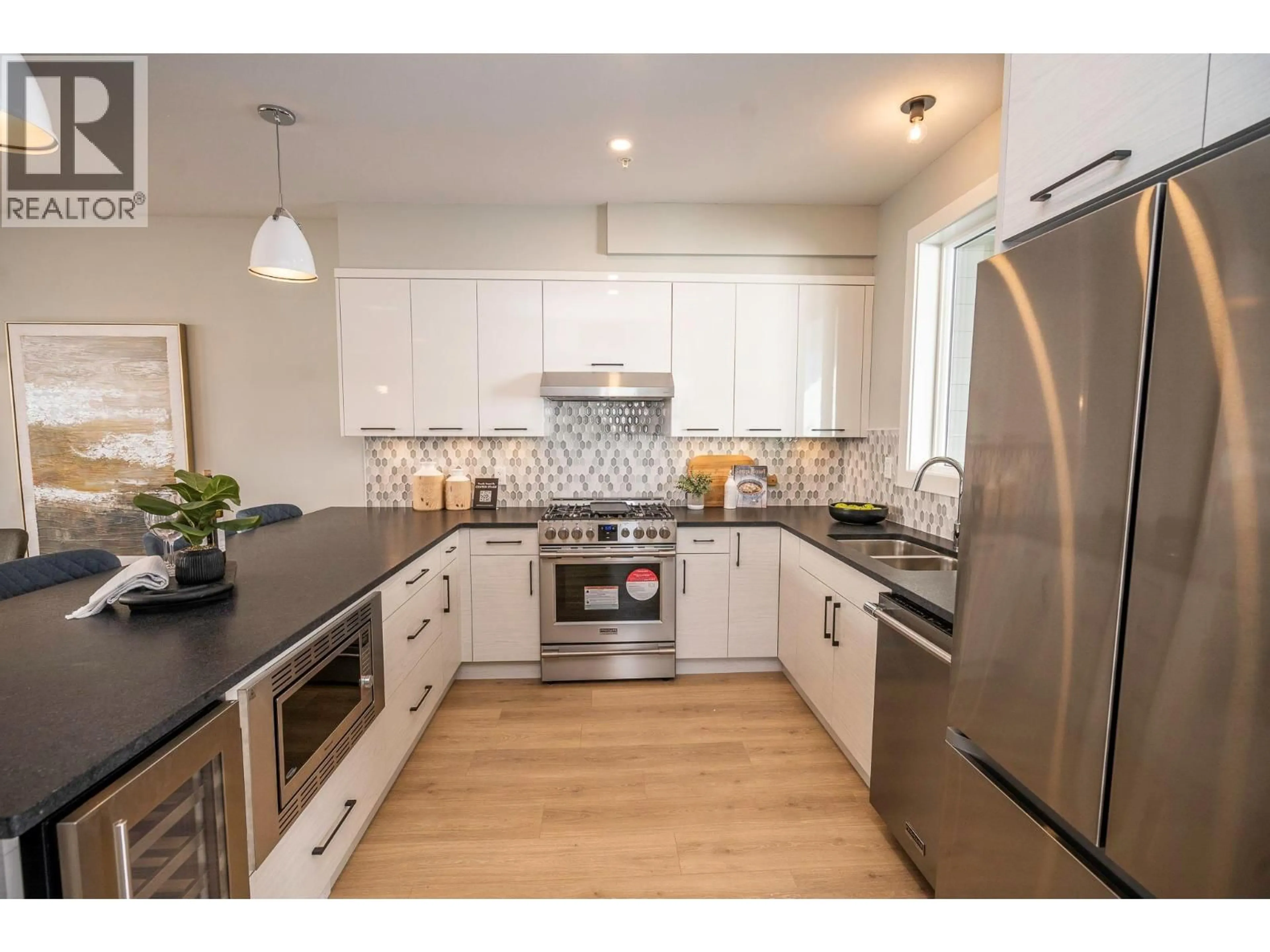 Open concept kitchen, unknown for 270A GRIZZLY RIDGE TRAIL, Big White British Columbia V1P1P4