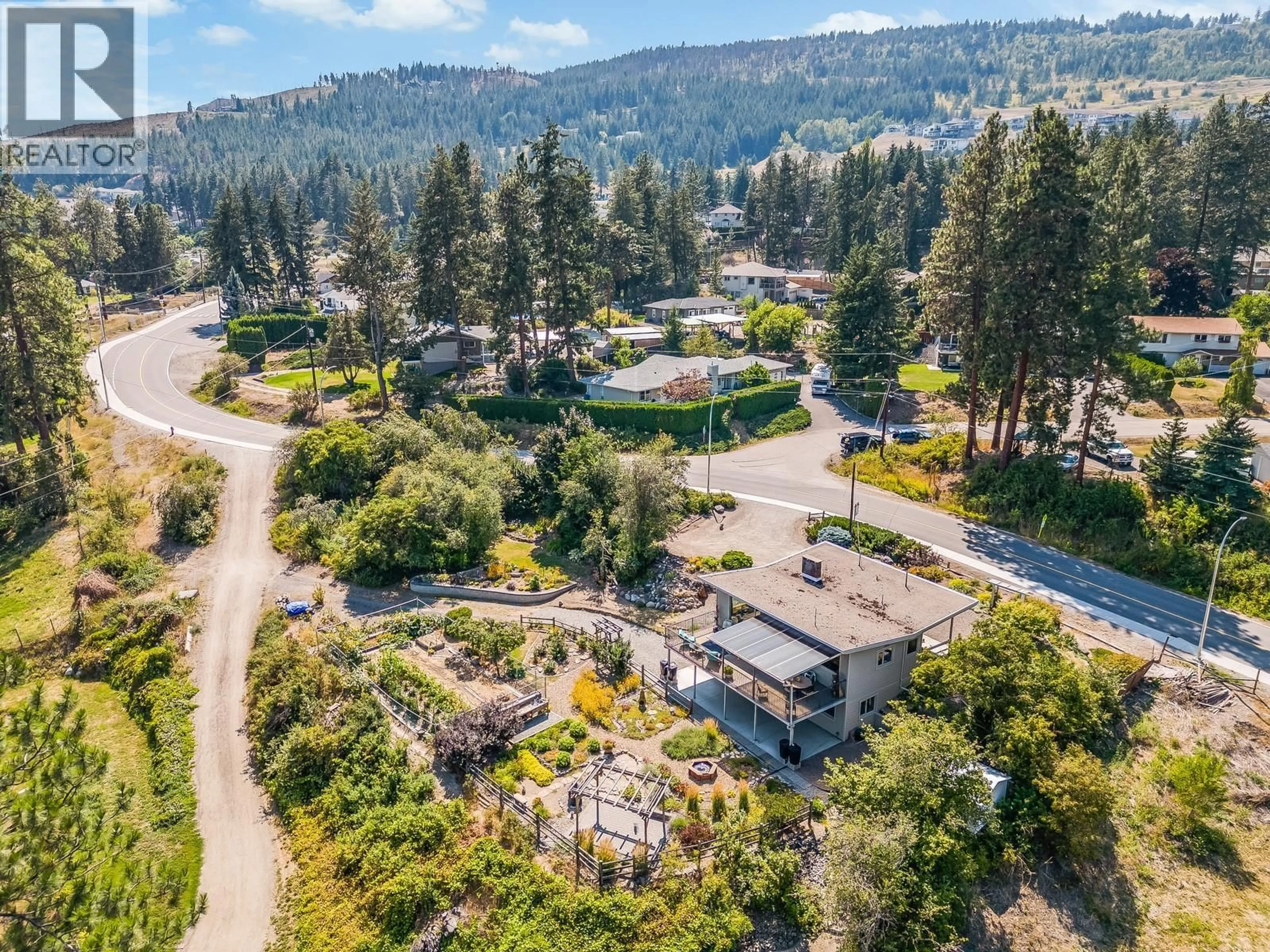 A pic from outside/outdoor area/front of a property/back of a property/a pic from drone, mountain view for 3535 MCIVER ROAD, Westbank British Columbia V4T1H8