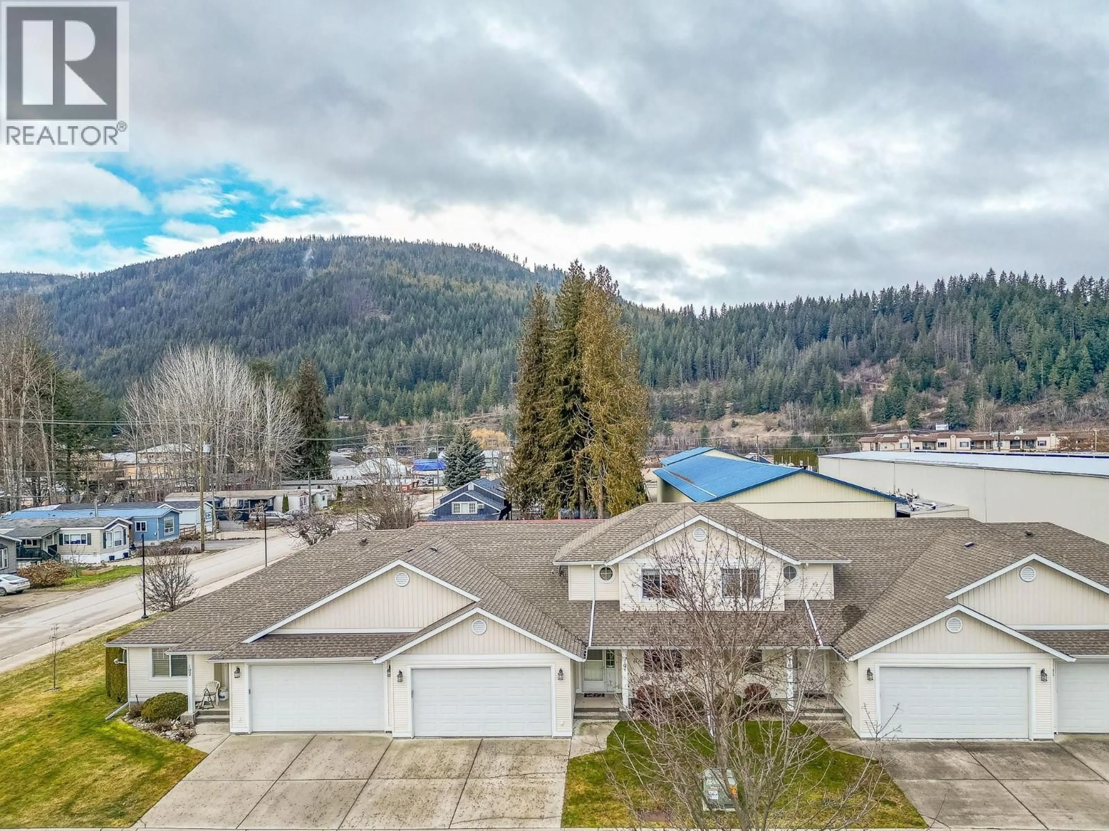 A pic from outside/outdoor area/front of a property/back of a property/a pic from drone, water/lake/river/ocean view for 104 - 222 MARTIN STREET, Sicamous British Columbia V0E2V0