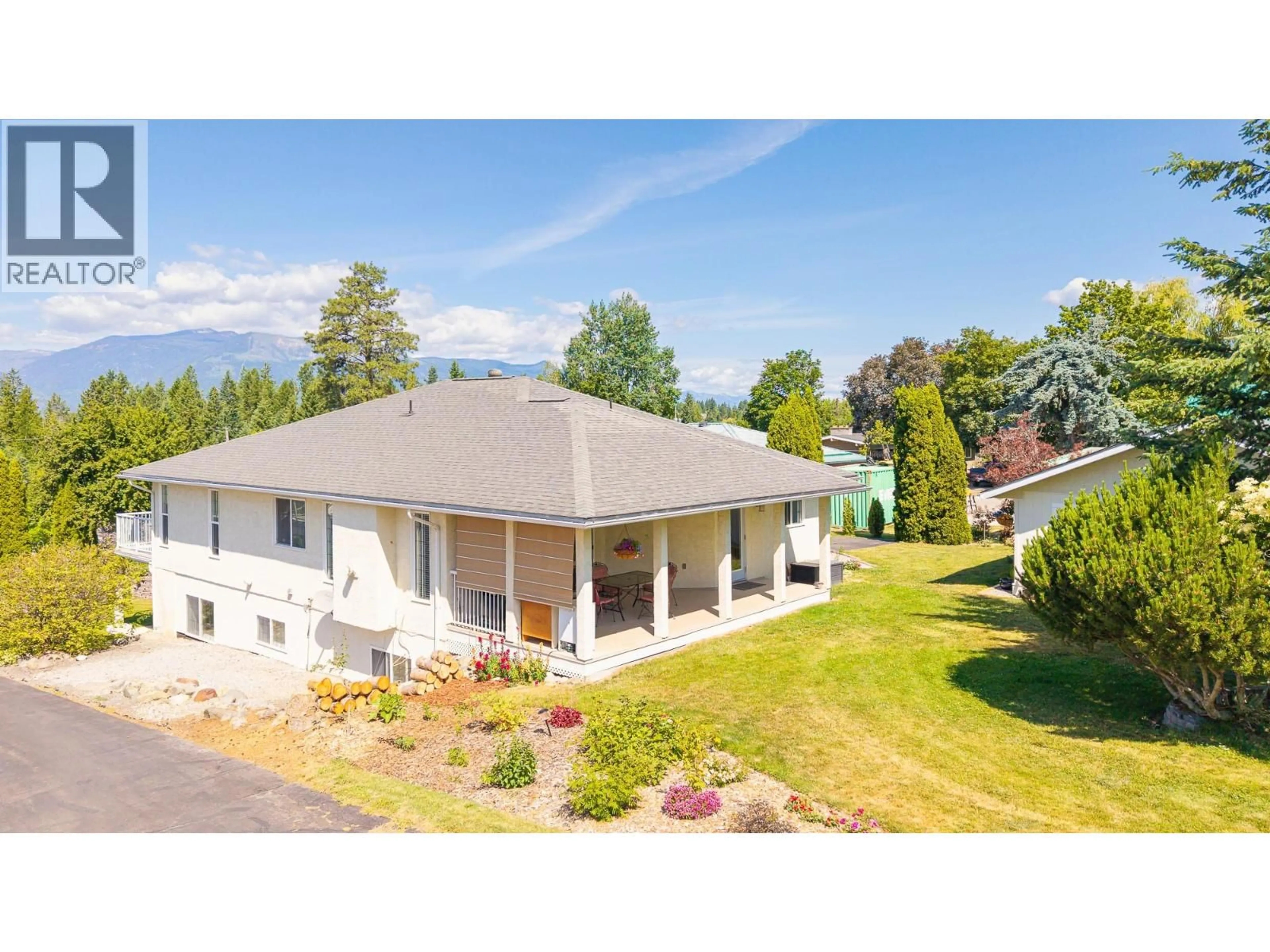 A pic from outside/outdoor area/front of a property/back of a property/a pic from drone, mountain view for 1506 1ST AVENUE NORTHWEST, Creston British Columbia V0B1G6