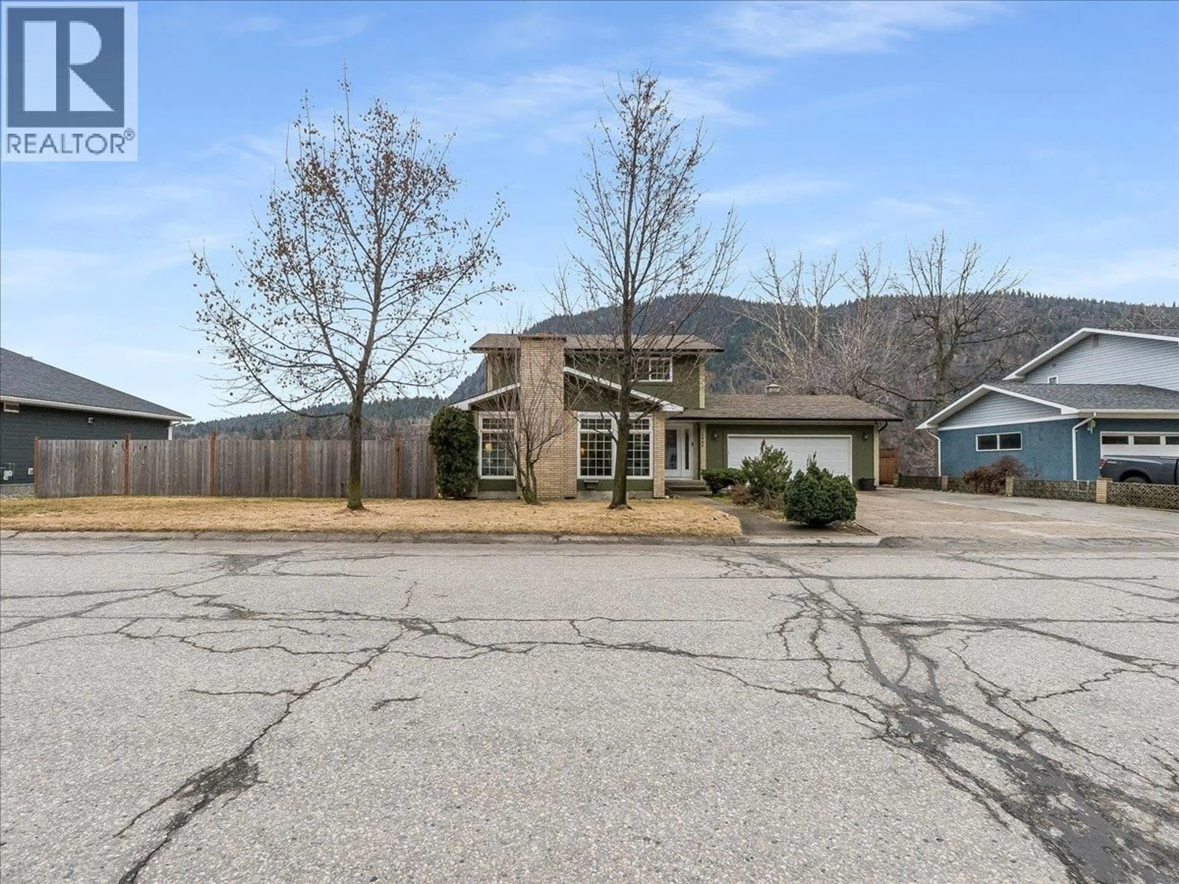 A pic from outside/outdoor area/front of a property/back of a property/a pic from drone, mountain view for 3866 CARNATION DRIVE, Trail British Columbia V1R4W9