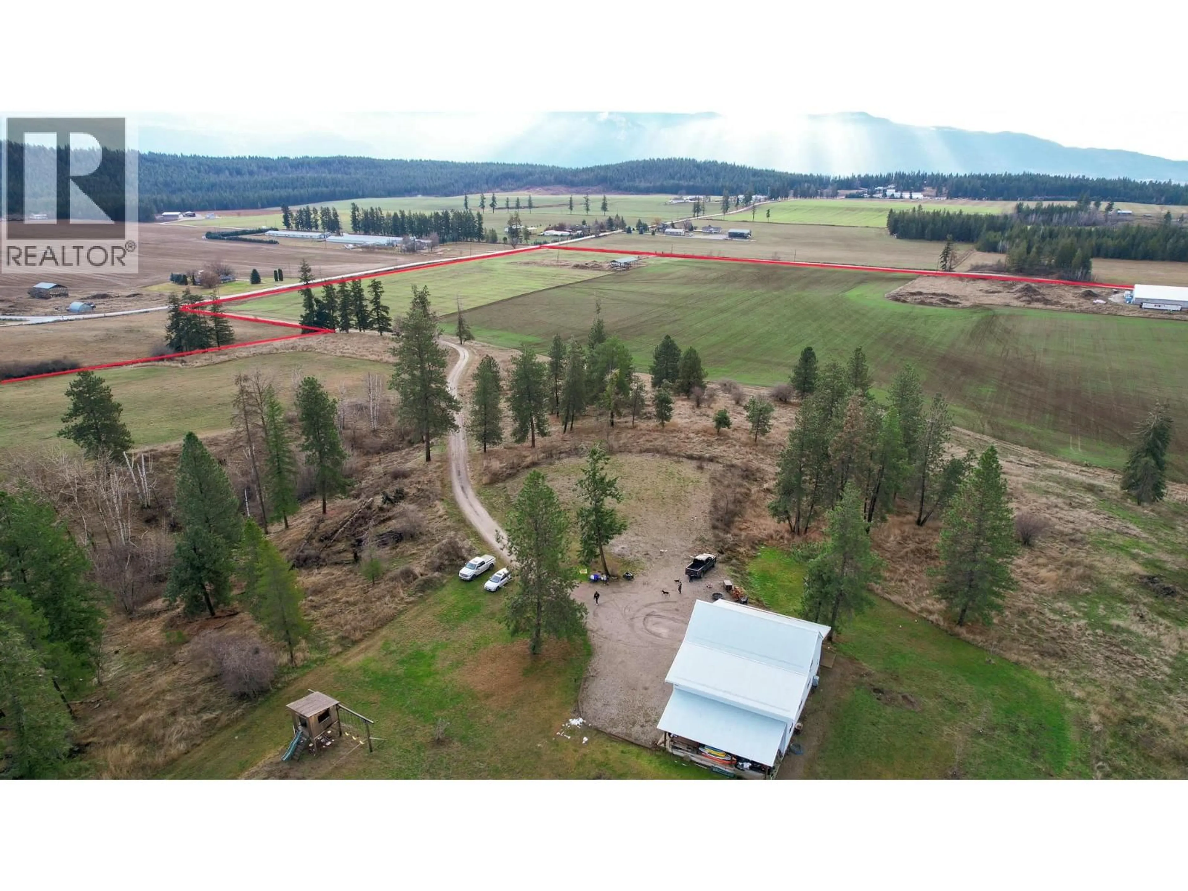A pic from outside/outdoor area/front of a property/back of a property/a pic from drone, forest/trees view for 3922 HULLCAR ROAD, Armstrong British Columbia V4Y0M7