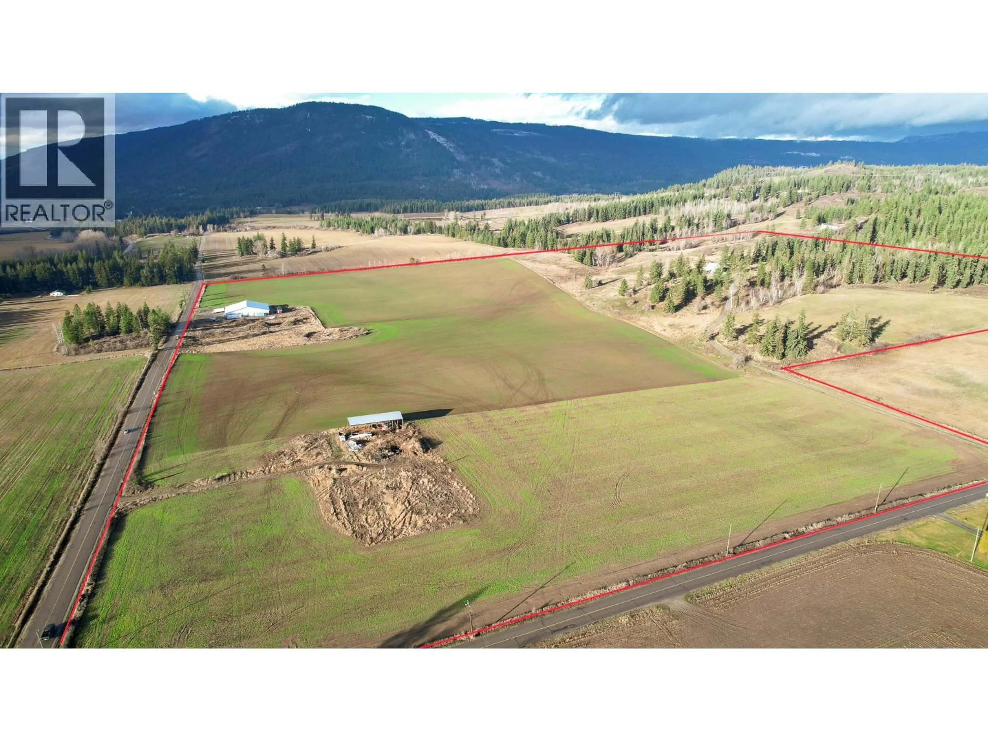 A pic from outside/outdoor area/front of a property/back of a property/a pic from drone, mountain view for 3922 HULLCAR ROAD, Armstrong British Columbia V4Y0M7