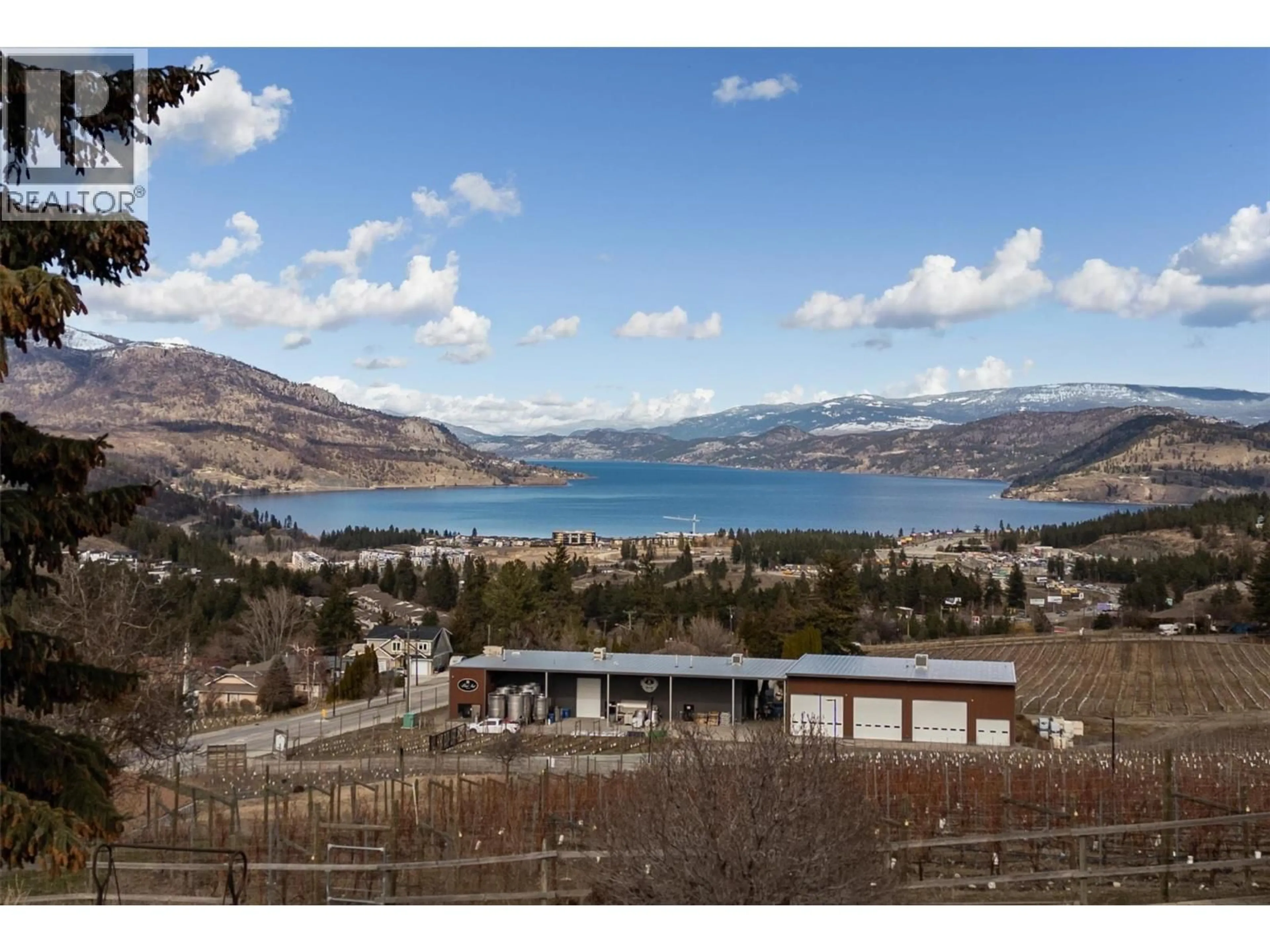 A pic from outside/outdoor area/front of a property/back of a property/a pic from drone, water/lake/river/ocean view for 2415 COLLINGWOOD ROAD, West Kelowna British Columbia V1Z2C3