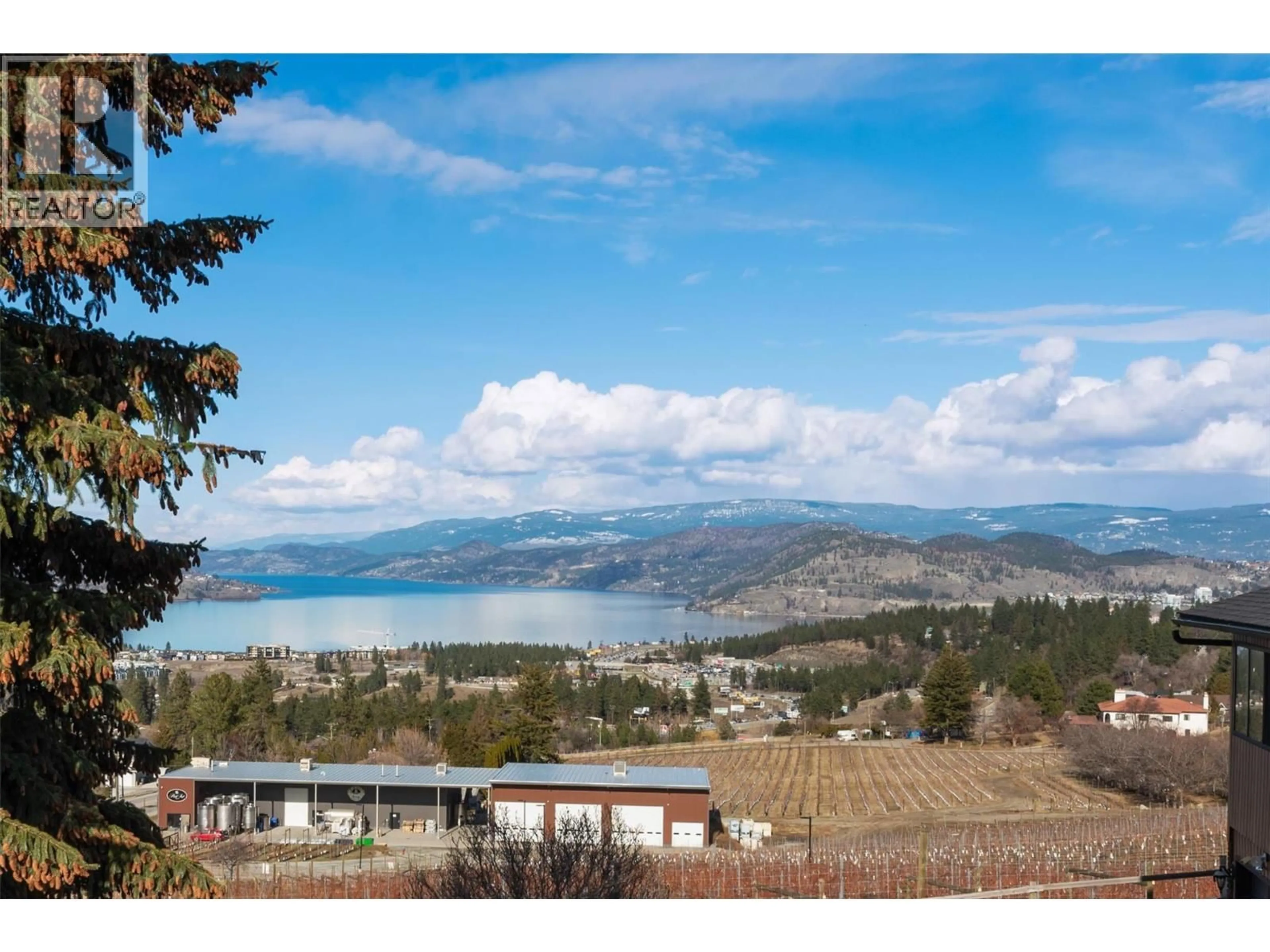 A pic from outside/outdoor area/front of a property/back of a property/a pic from drone, water/lake/river/ocean view for 2415 COLLINGWOOD ROAD, West Kelowna British Columbia V1Z2C3