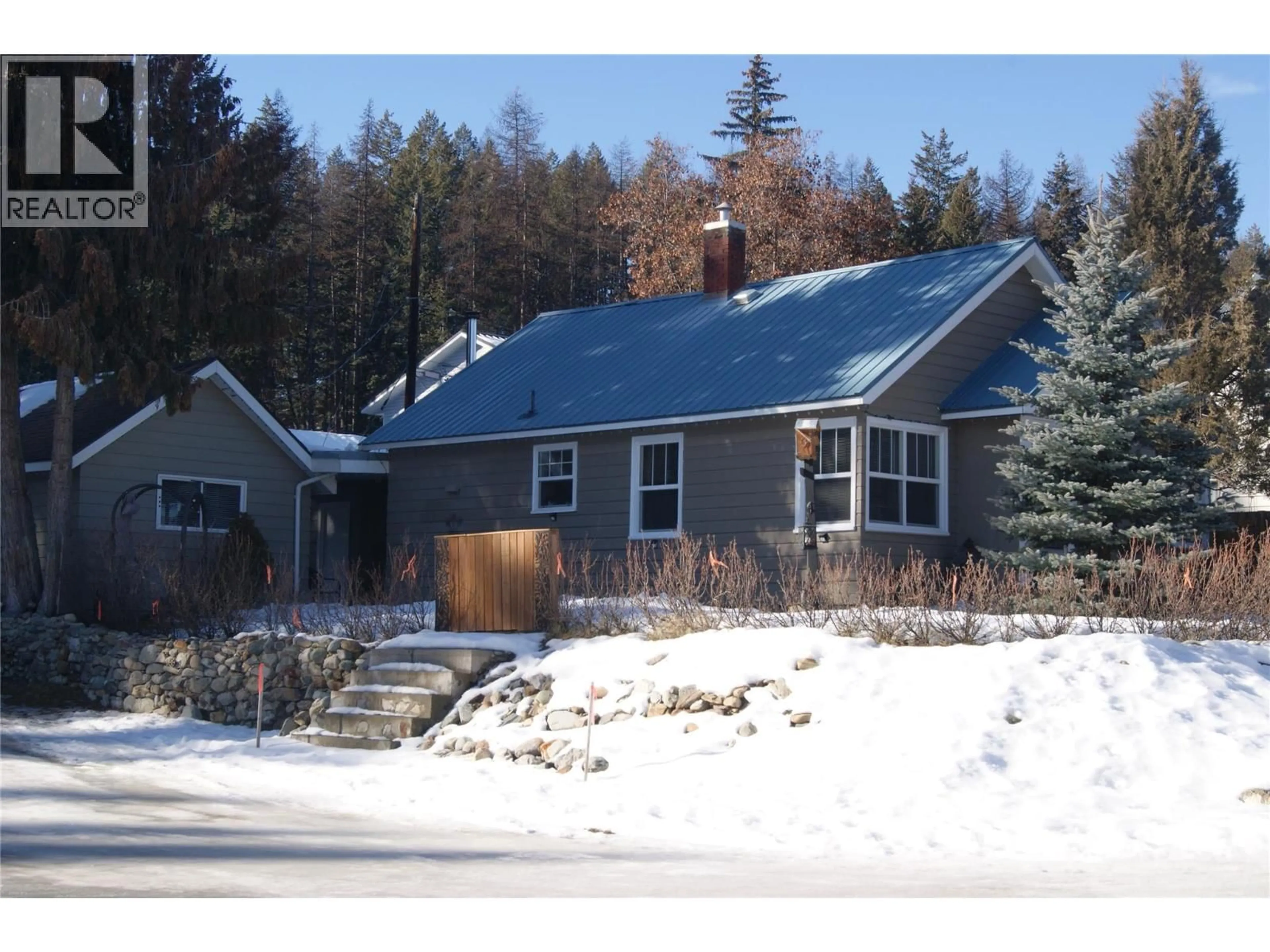 Home with vinyl exterior material, street for 2465 DEWOLFE AVENUE, Kimberley British Columbia V1A1R1