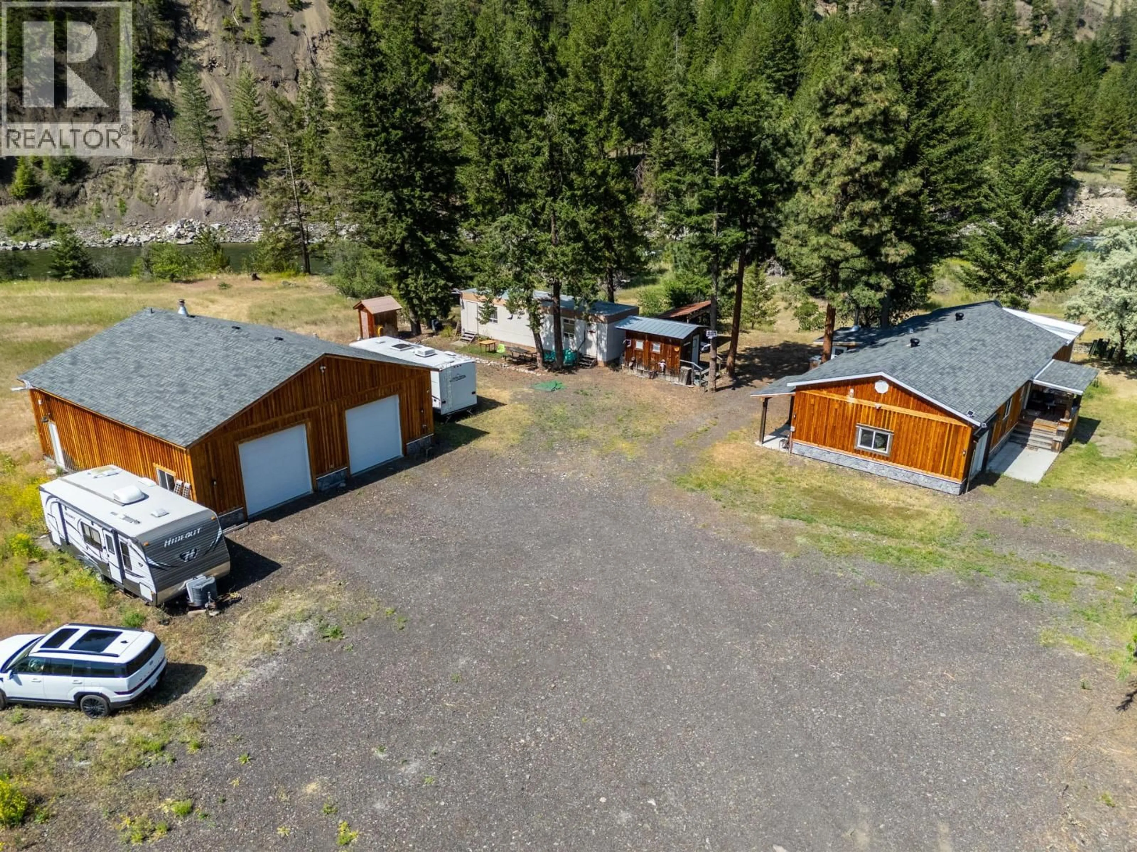 A pic from outside/outdoor area/front of a property/back of a property/a pic from drone, mountain view for 6097 HIGHWAY 3 OTHER, Hedley British Columbia V0X1N1