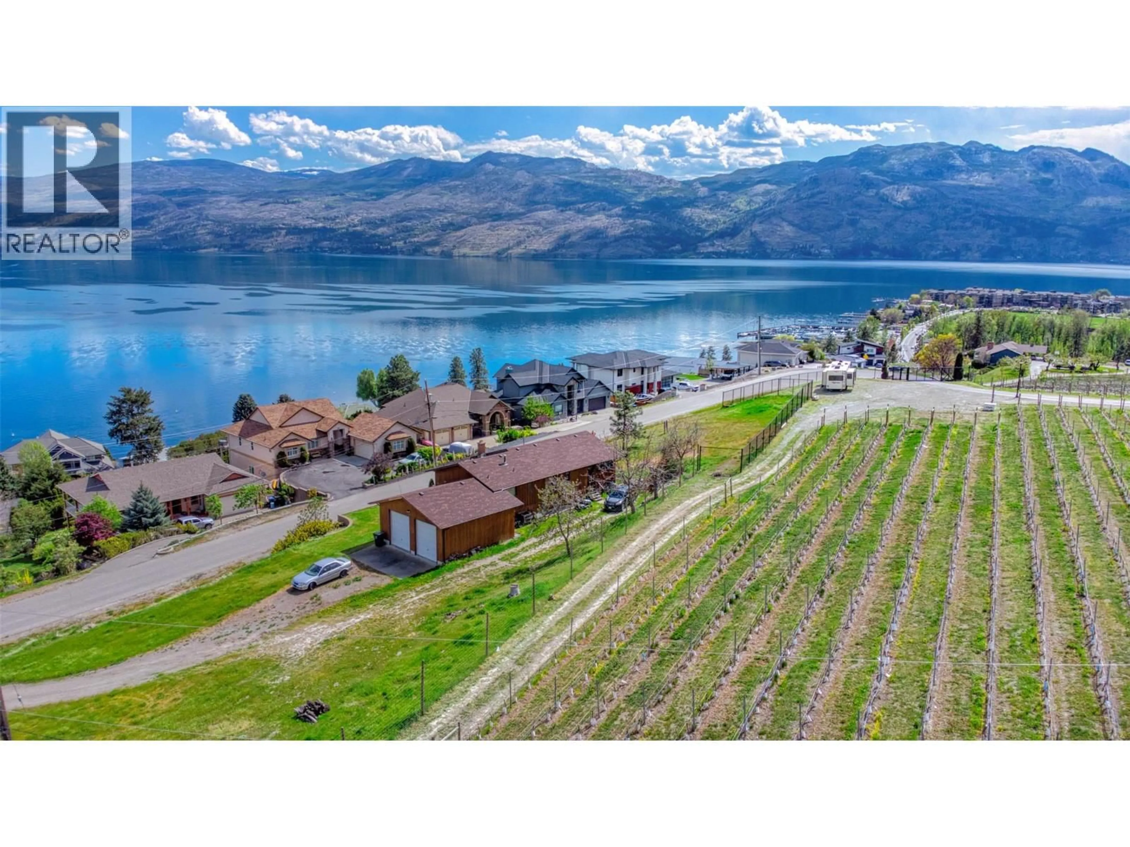 A pic from outside/outdoor area/front of a property/back of a property/a pic from drone, water/lake/river/ocean view for 3924 HARDING ROAD, West Kelowna British Columbia V4T2J9