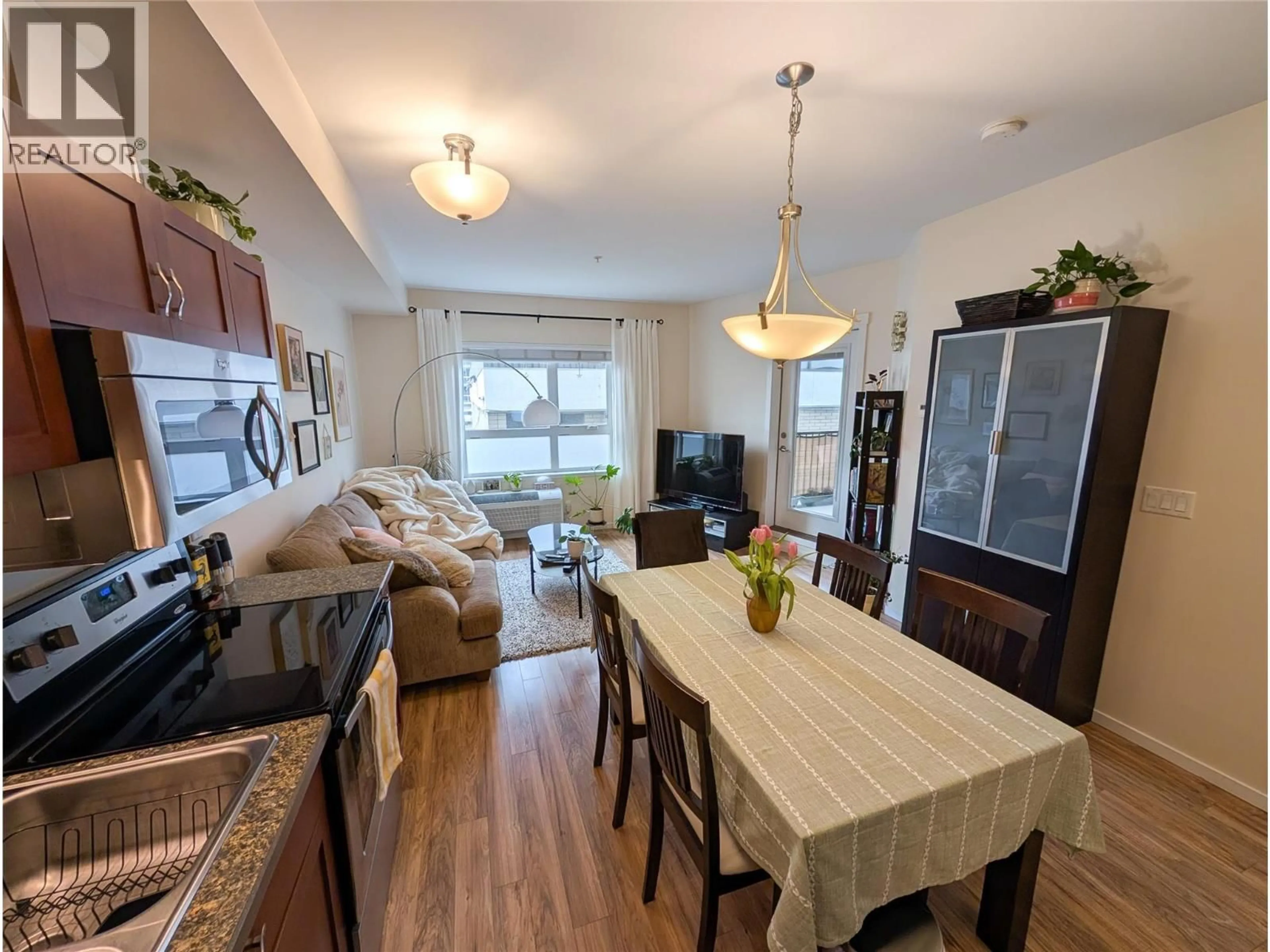 Open concept kitchen, wood/laminate floor for 209 - 429 ST PAUL STREET, Kamloops British Columbia V2C2J7
