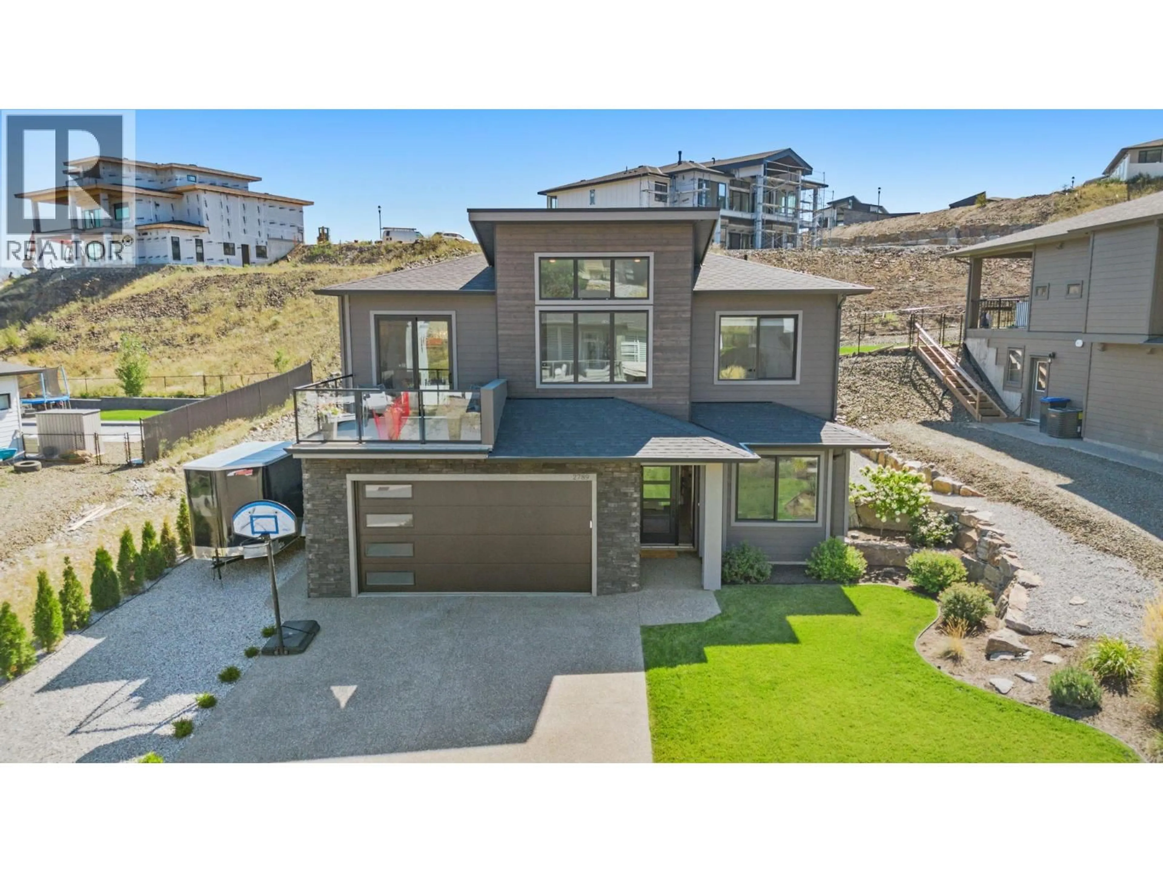 Home with vinyl exterior material, street for 2789 CANYON CREST DRIVE, West Kelowna British Columbia V4T3A6