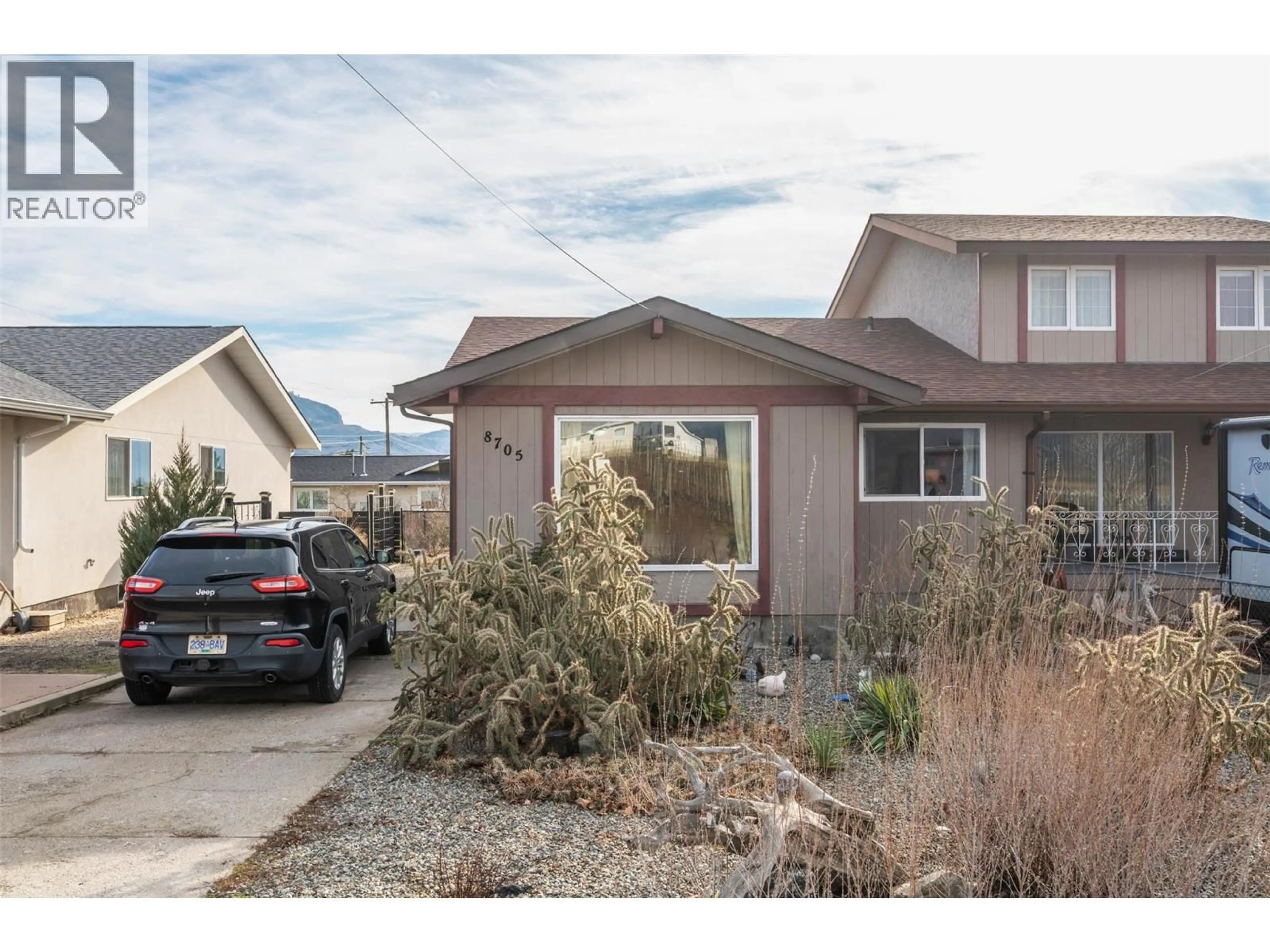 Home with vinyl exterior material, street for 8705 92ND AVENUE, Osoyoos British Columbia V0H1V2