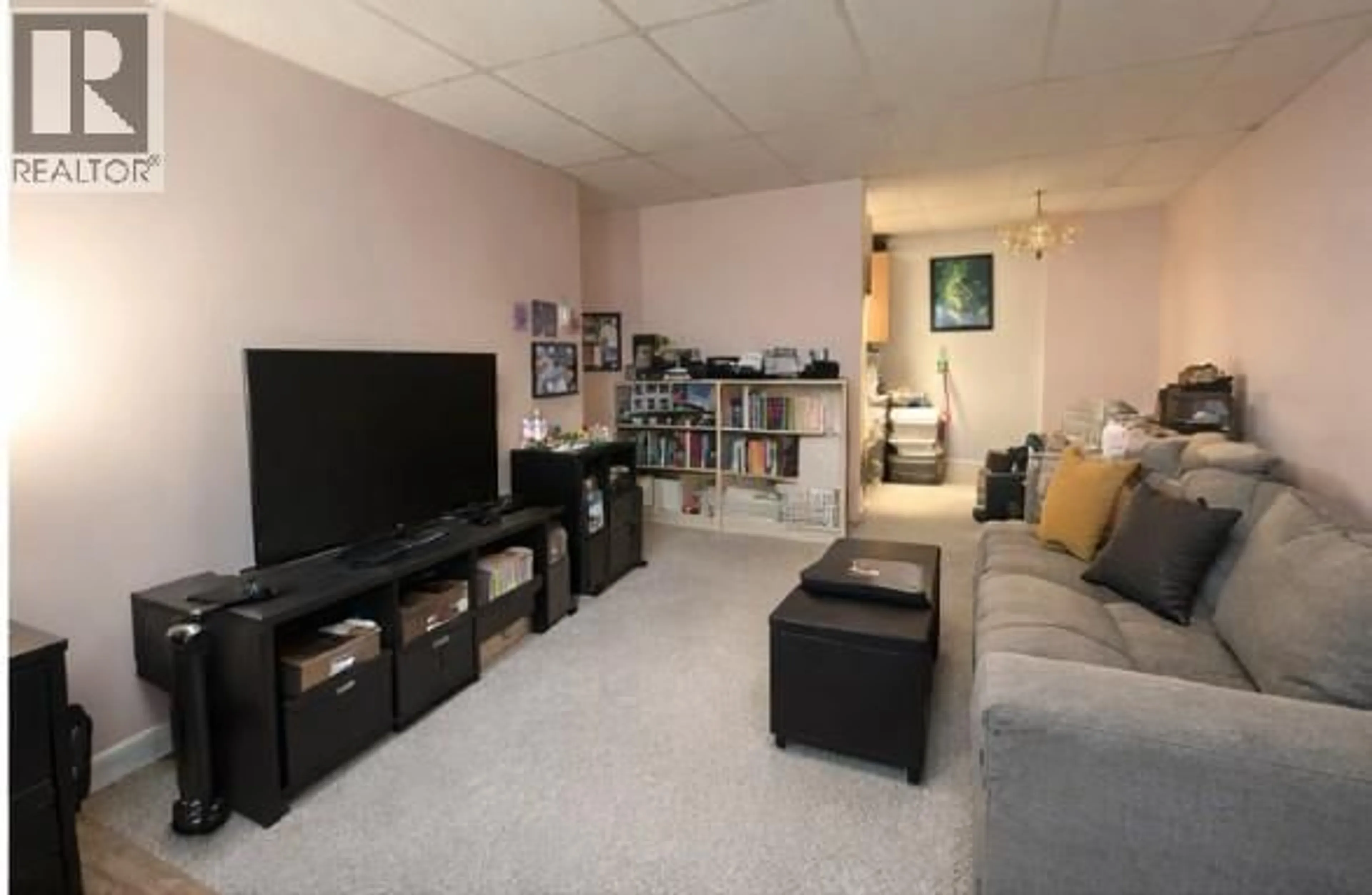 Living room with furniture, unknown for 101 - 1410 PENTICTON AVENUE, Penticton British Columbia V2A2N5