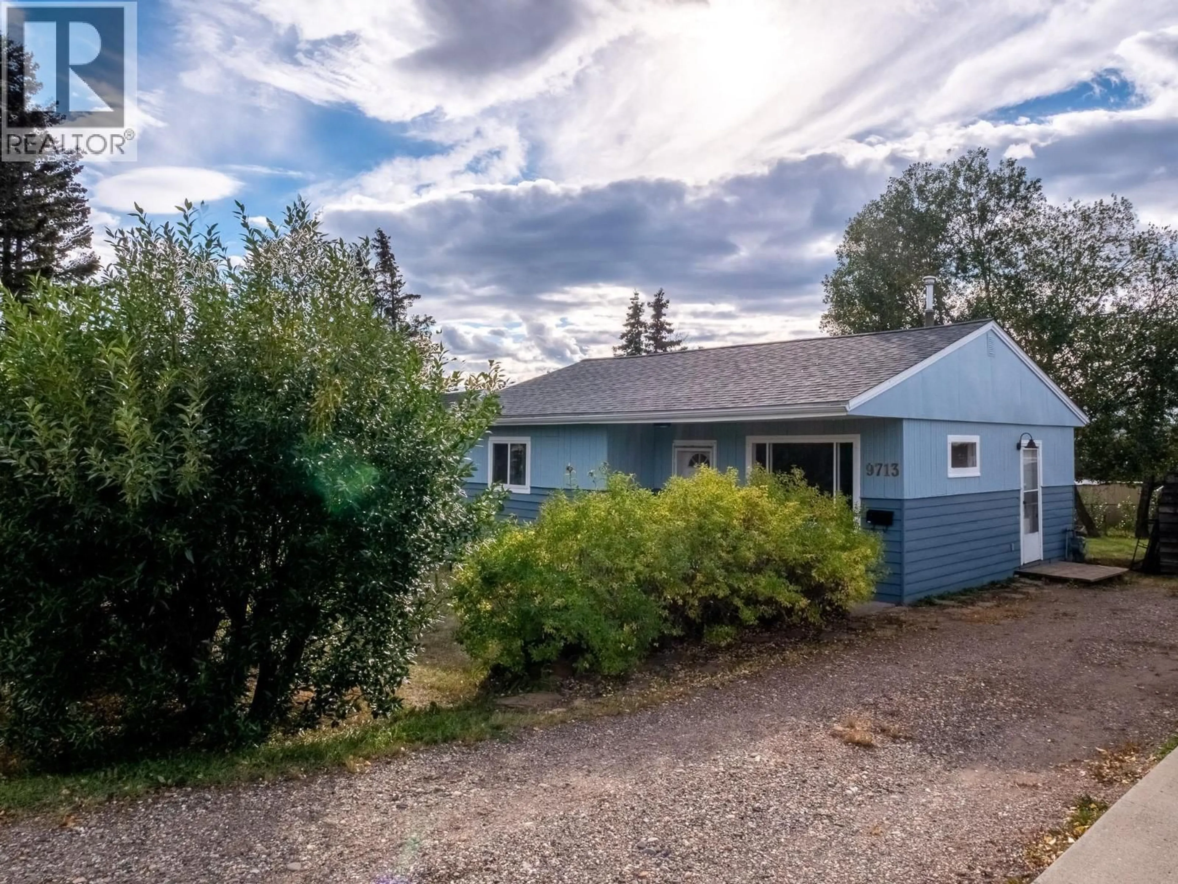A pic from outside/outdoor area/front of a property/back of a property/a pic from drone, street for 9713 9 STREET, Dawson Creek British Columbia V1G3S7