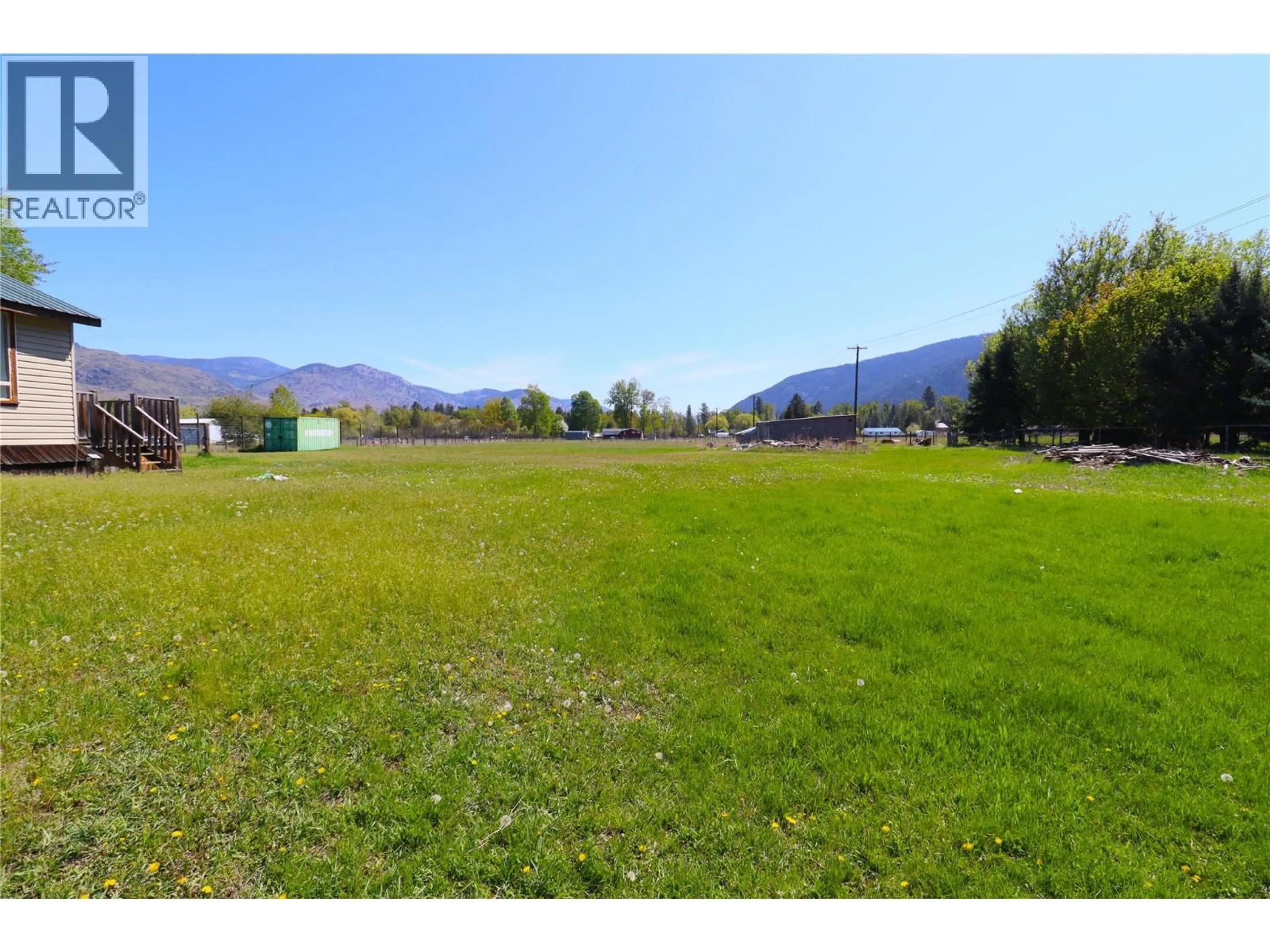 A pic from outside/outdoor area/front of a property/back of a property/a pic from drone, mountain view for 5818 17TH STREET, Grand Forks British Columbia V0H1H0