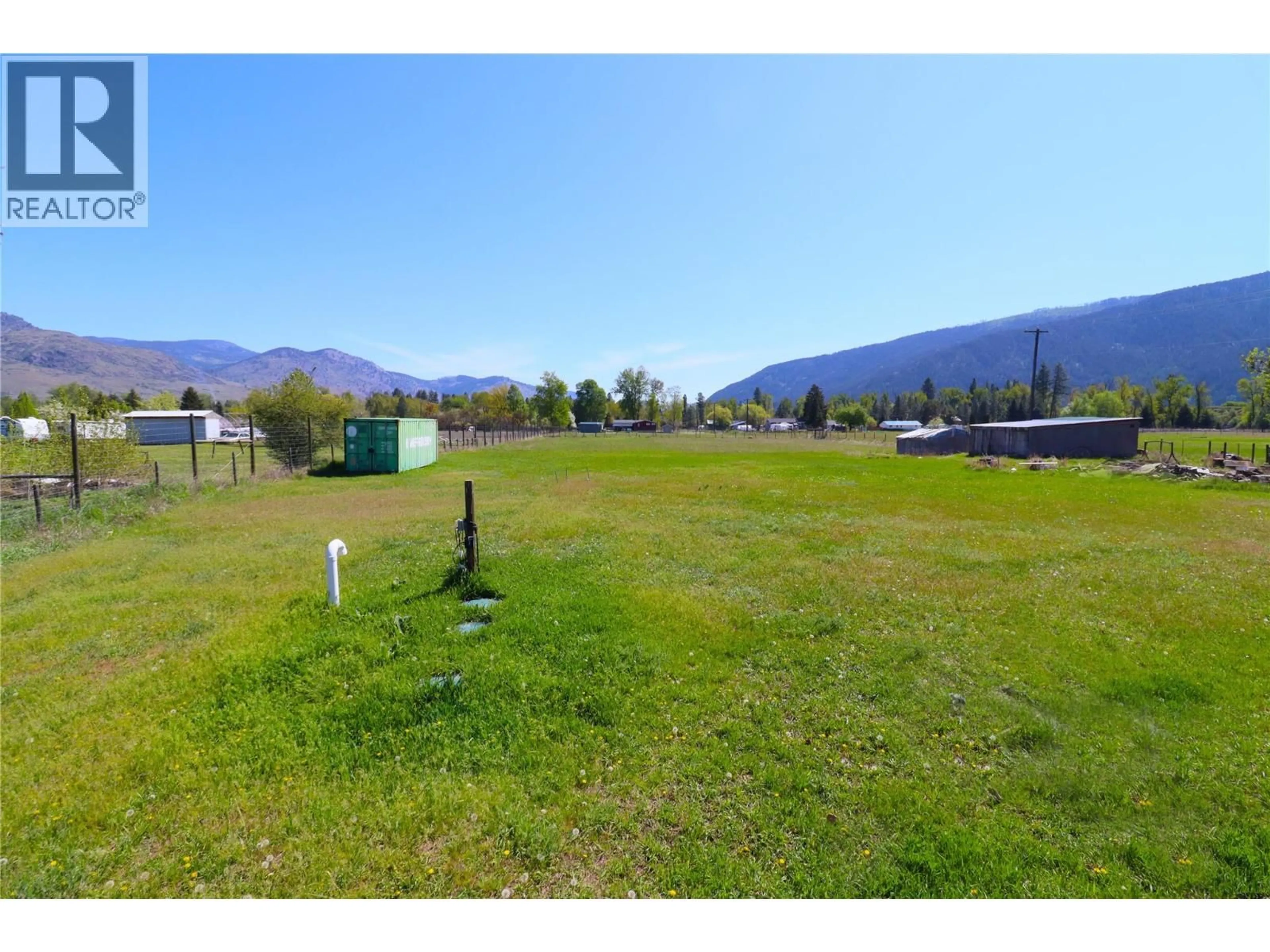 A pic from outside/outdoor area/front of a property/back of a property/a pic from drone, mountain view for 5818 17TH STREET, Grand Forks British Columbia V0H1H0