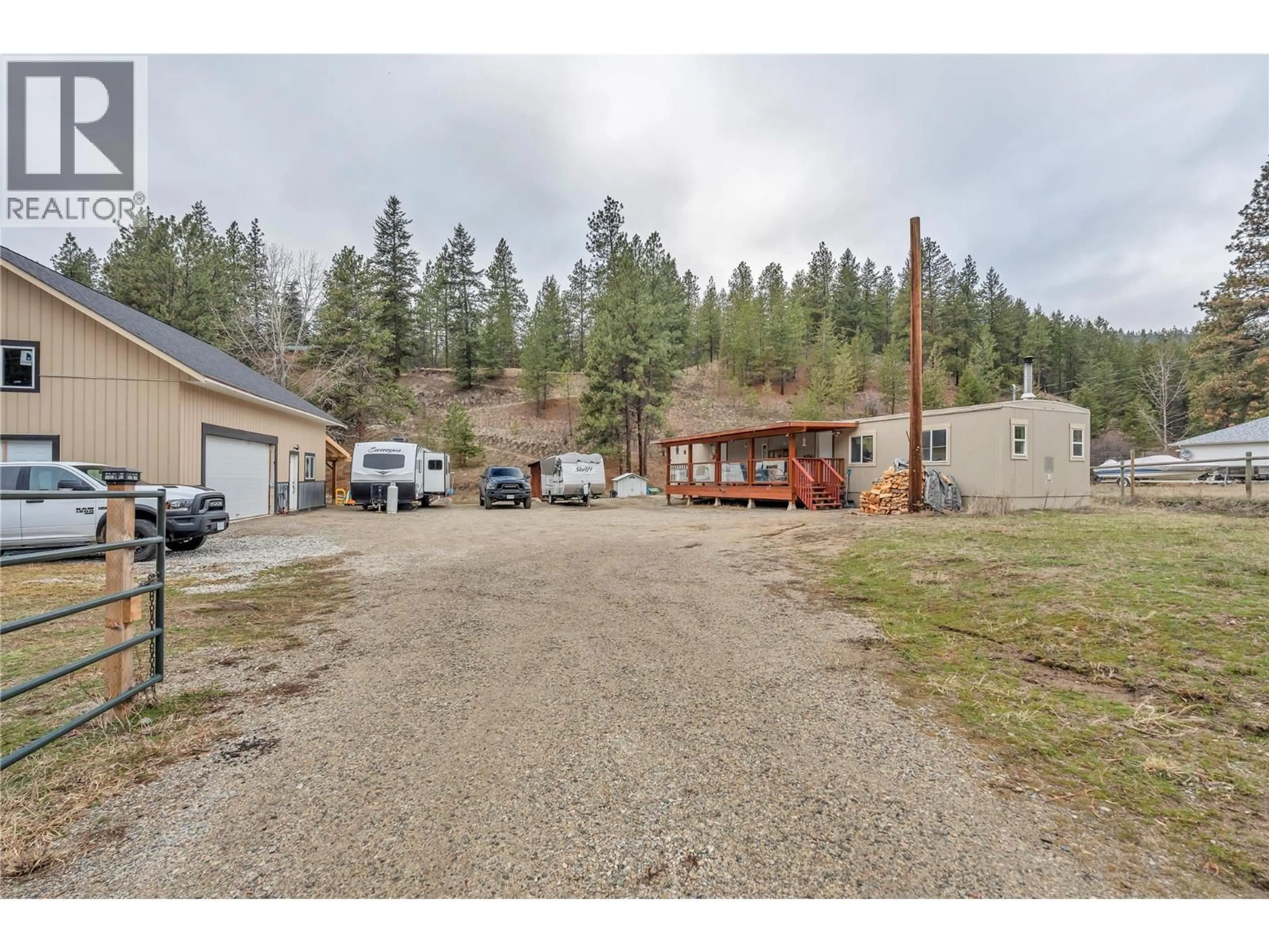 A pic from outside/outdoor area/front of a property/back of a property/a pic from drone, unknown for 74 FISH LAKE ROAD, Summerland British Columbia V0H1Z8