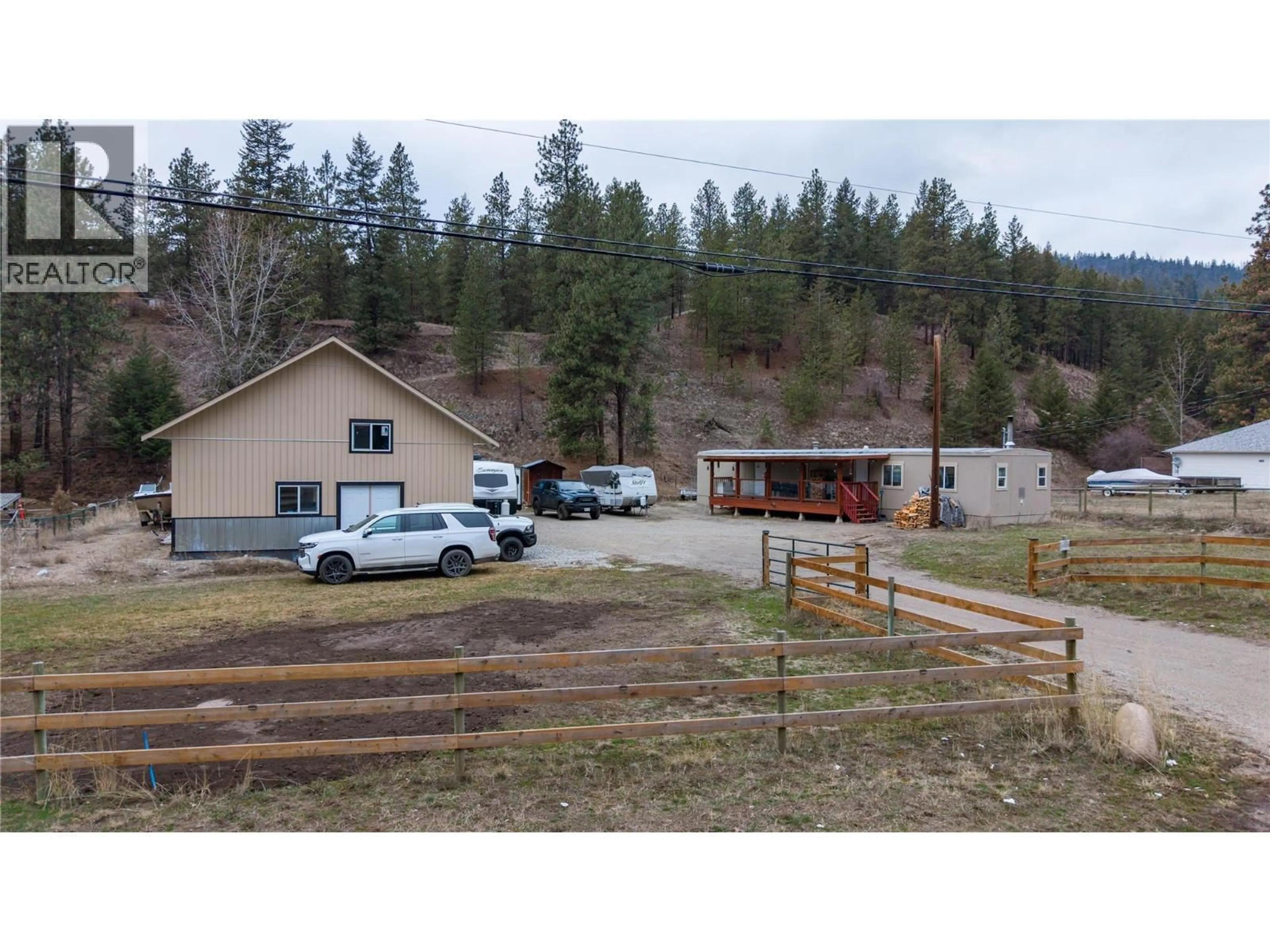 A pic from outside/outdoor area/front of a property/back of a property/a pic from drone, mountain view for 74 FISH LAKE ROAD, Summerland British Columbia V0H1Z8