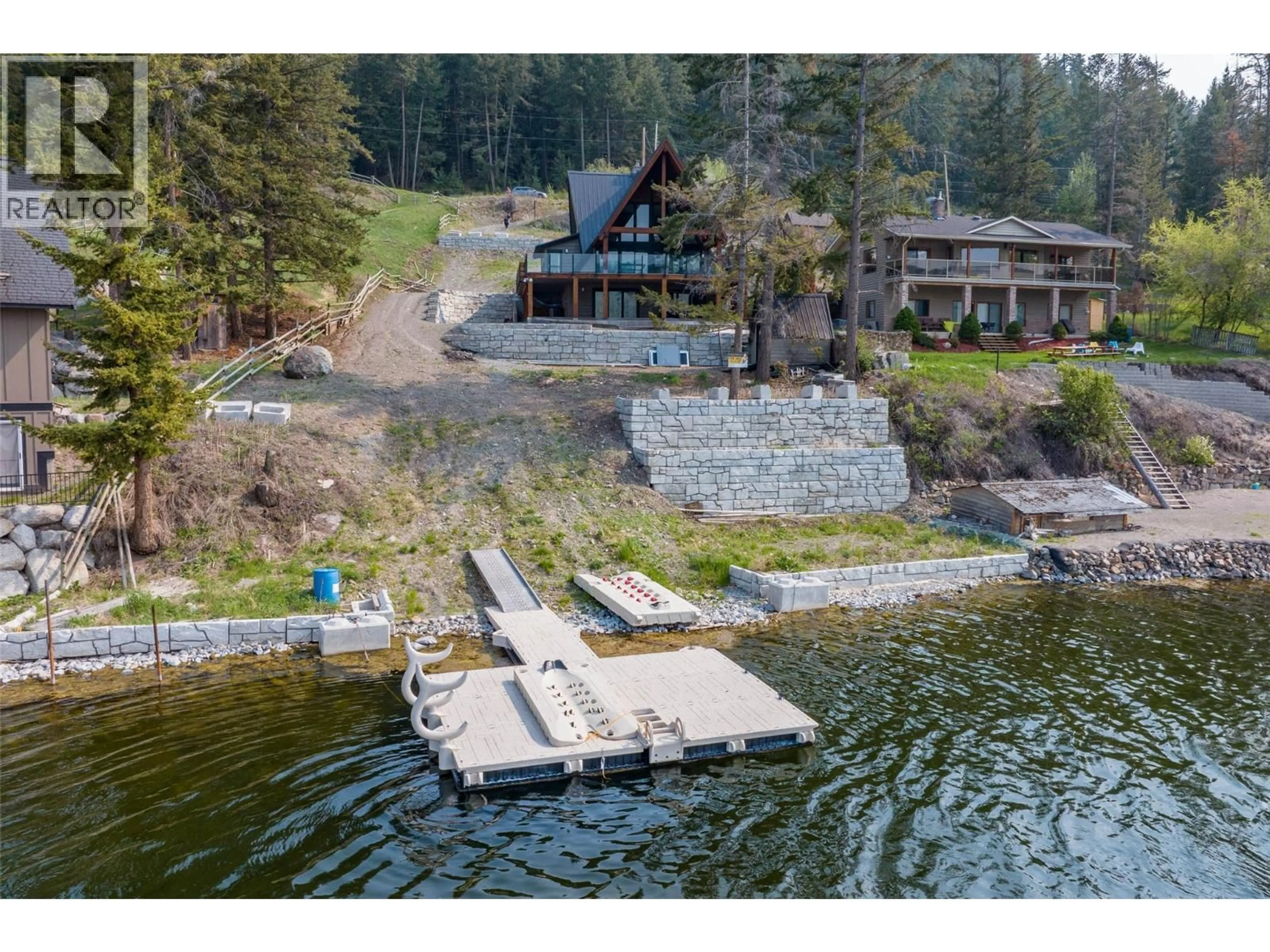 A pic from outside/outdoor area/front of a property/back of a property/a pic from drone, water/lake/river/ocean view for 9027 PLANET MINE ROAD, Stump Lake British Columbia V1K0C5