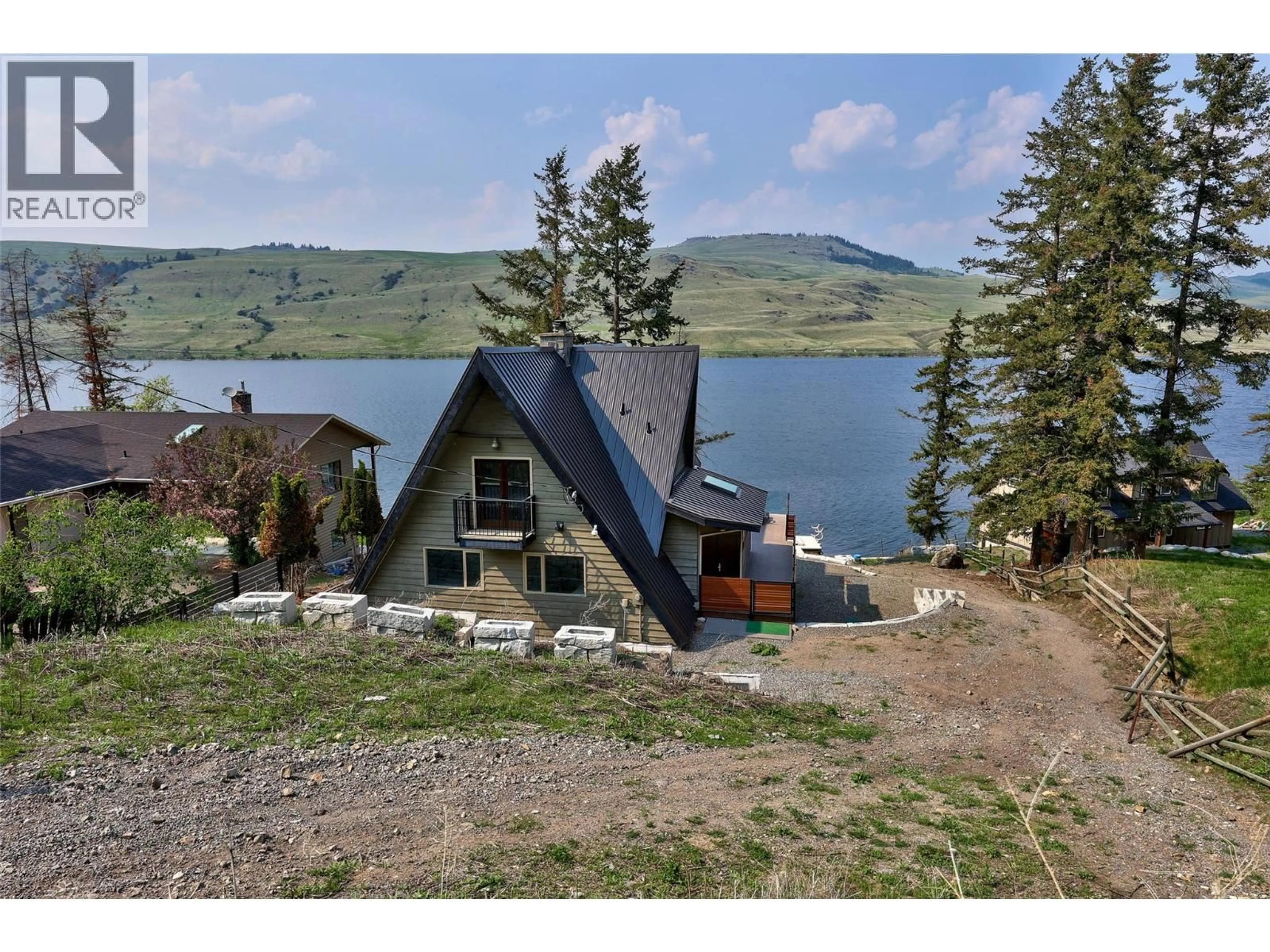 A pic from outside/outdoor area/front of a property/back of a property/a pic from drone, water/lake/river/ocean view for 9027 PLANET MINE ROAD, Stump Lake British Columbia V1K0C5
