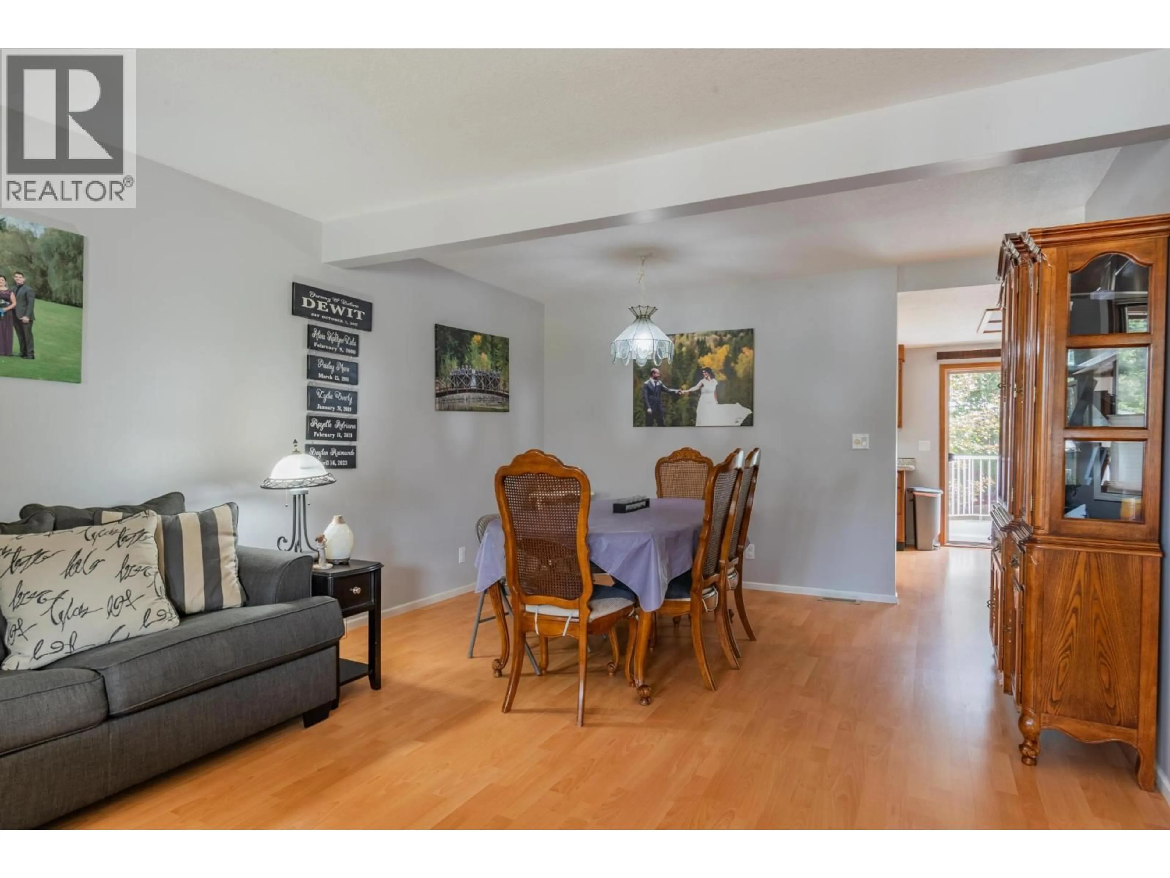 Dining room, wood/laminate floor for 110 CEDAR AVENUE, Fruitvale British Columbia V0G1L0