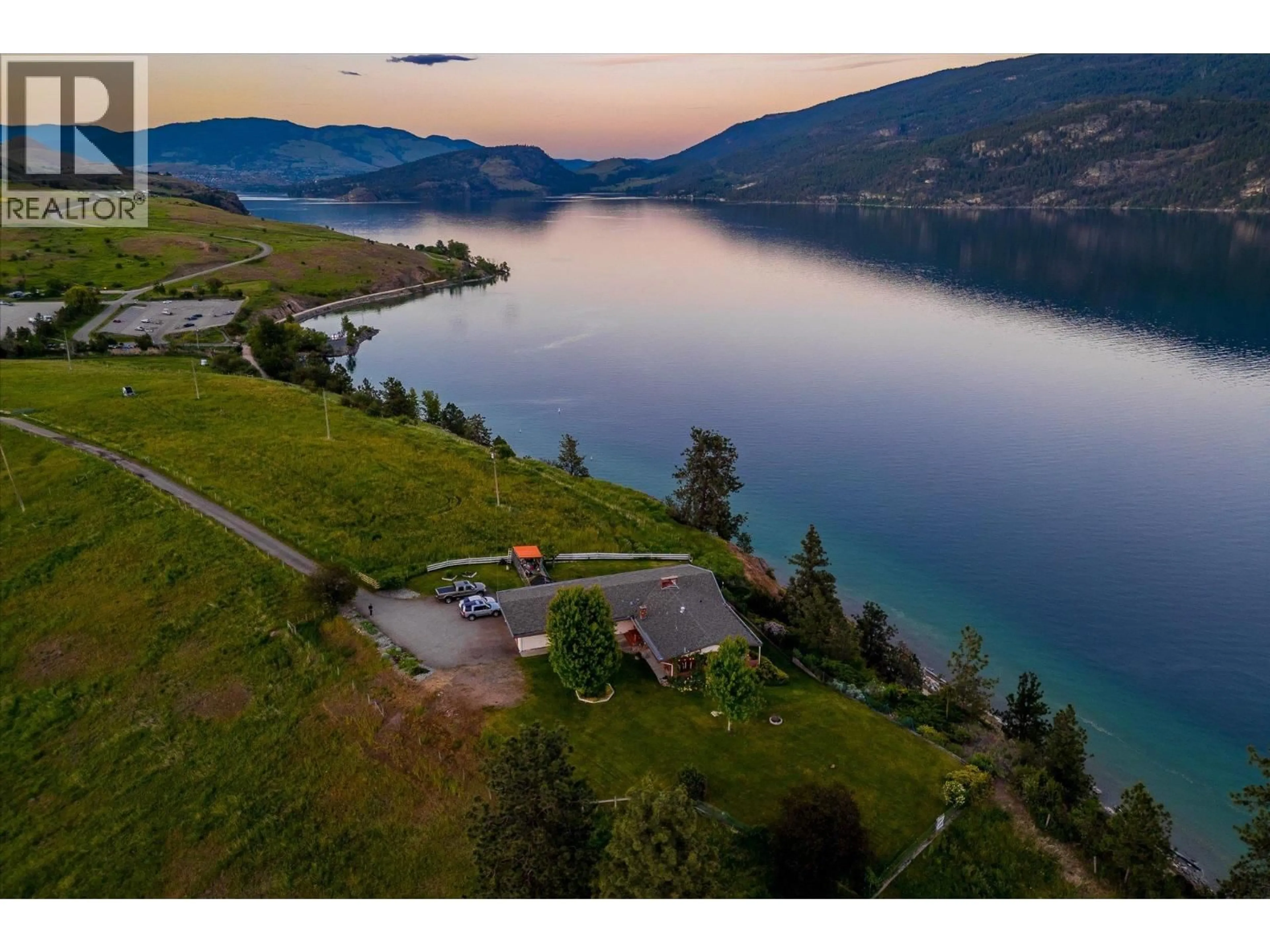 A pic from outside/outdoor area/front of a property/back of a property/a pic from drone, water/lake/river/ocean view for 201 HIGHWAY 97 OTHER, Vernon British Columbia V1H1G1
