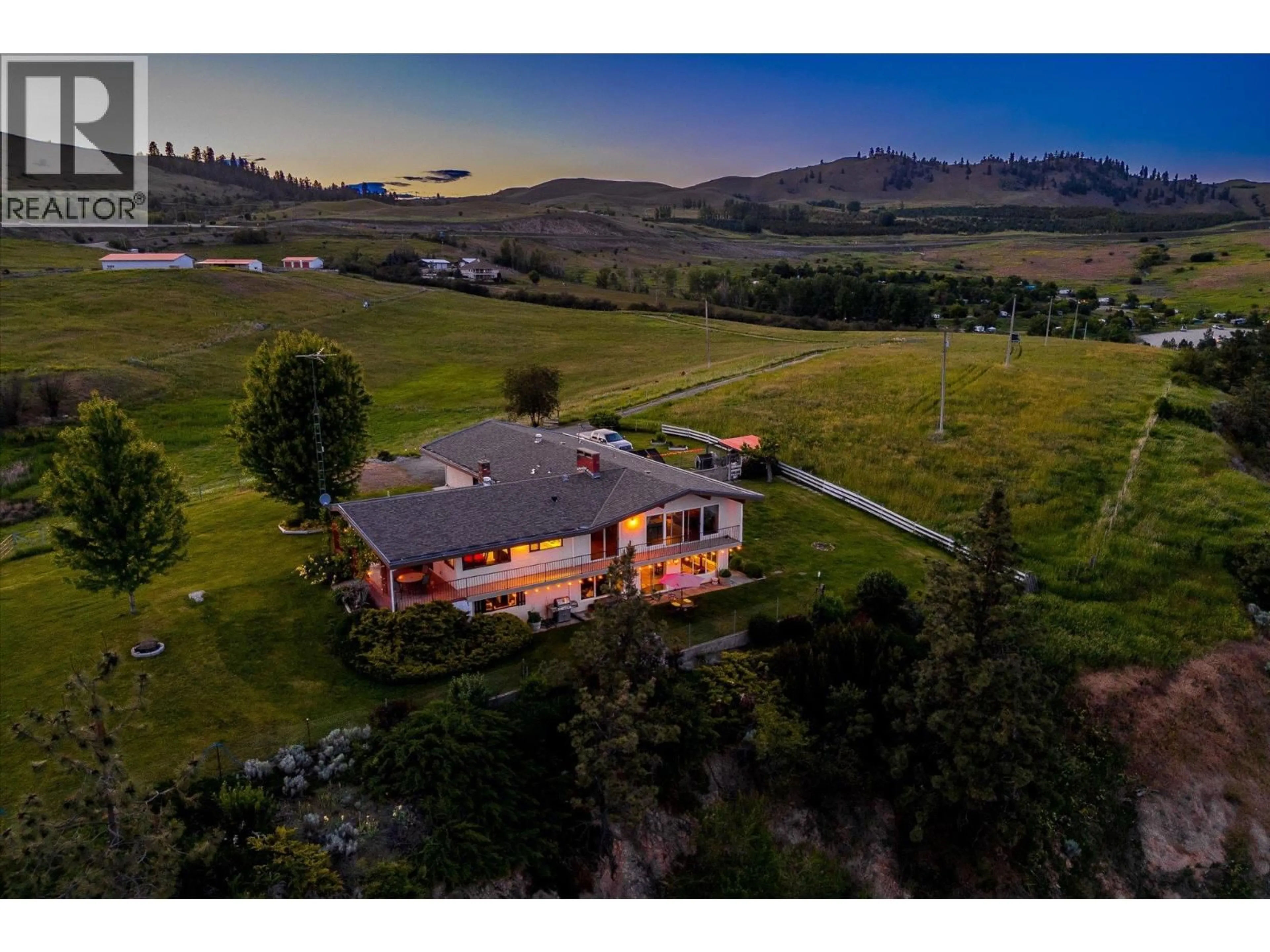 A pic from outside/outdoor area/front of a property/back of a property/a pic from drone, mountain view for 201 HIGHWAY 97 OTHER, Vernon British Columbia V1H1G1
