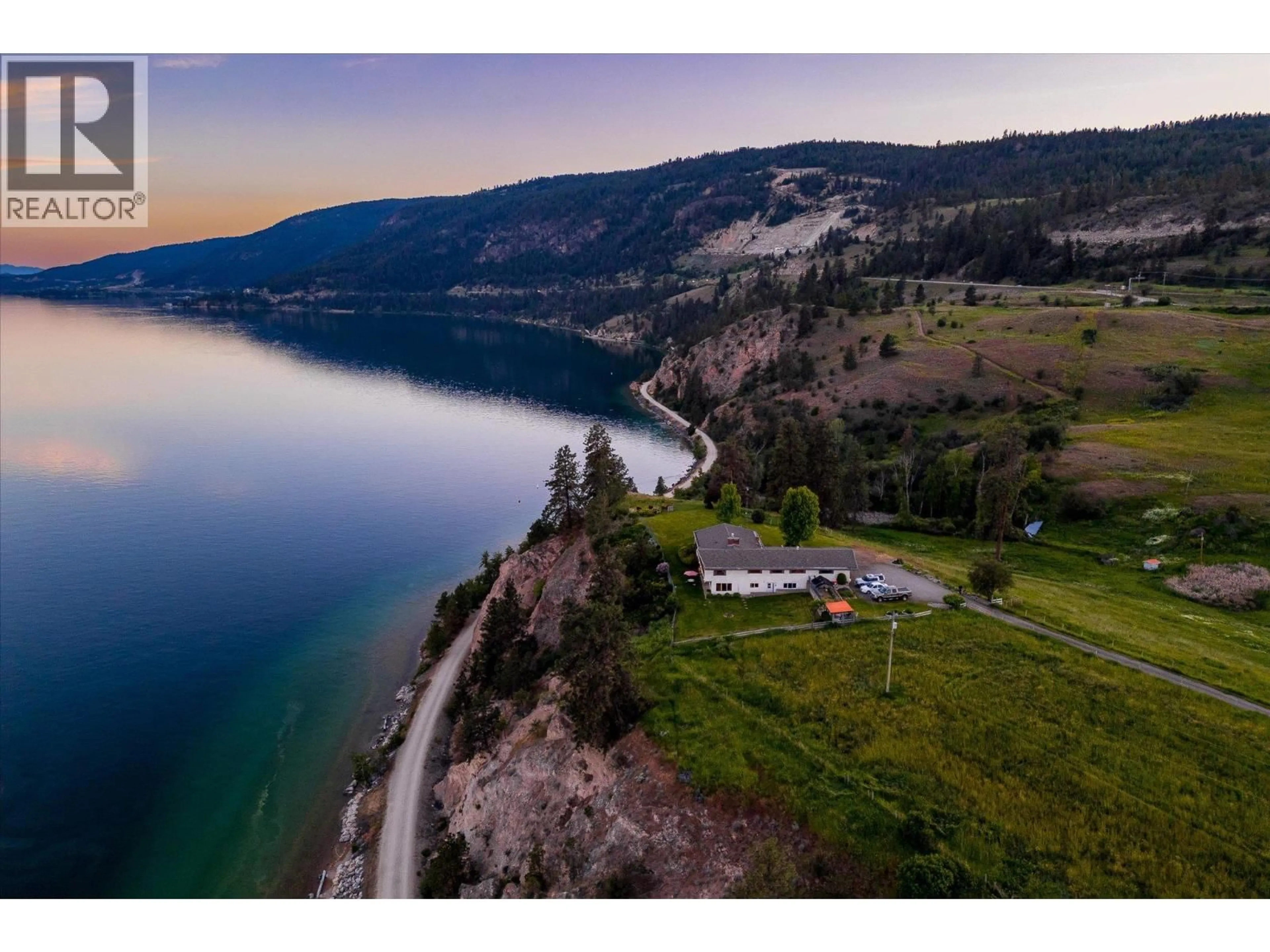 A pic from outside/outdoor area/front of a property/back of a property/a pic from drone, water/lake/river/ocean view for 201 HIGHWAY 97 OTHER, Vernon British Columbia V1H1G1