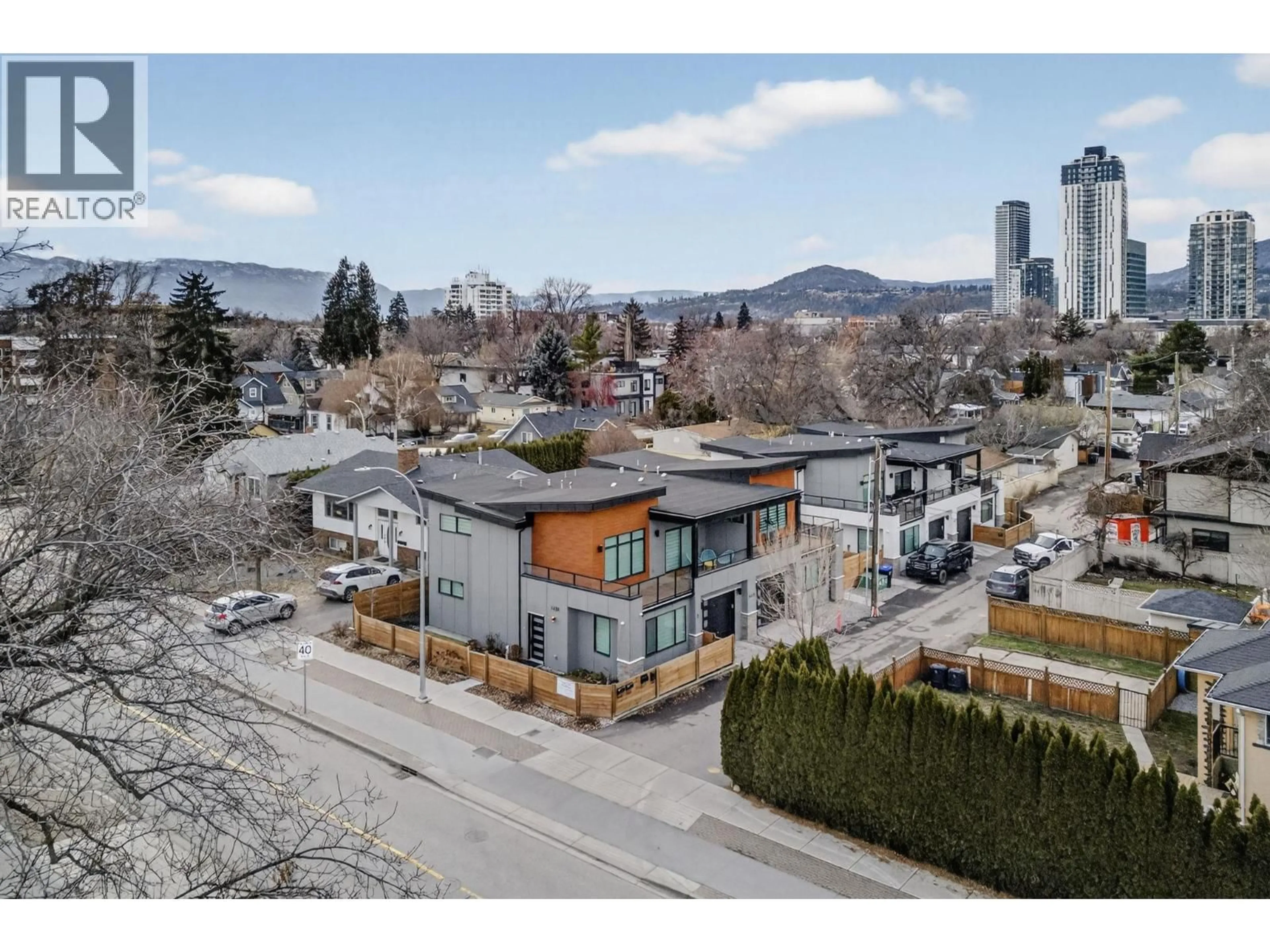 A pic from outside/outdoor area/front of a property/back of a property/a pic from drone, mountain view for 2 - 1452 ETHEL STREET, Kelowna British Columbia V1Y2X7