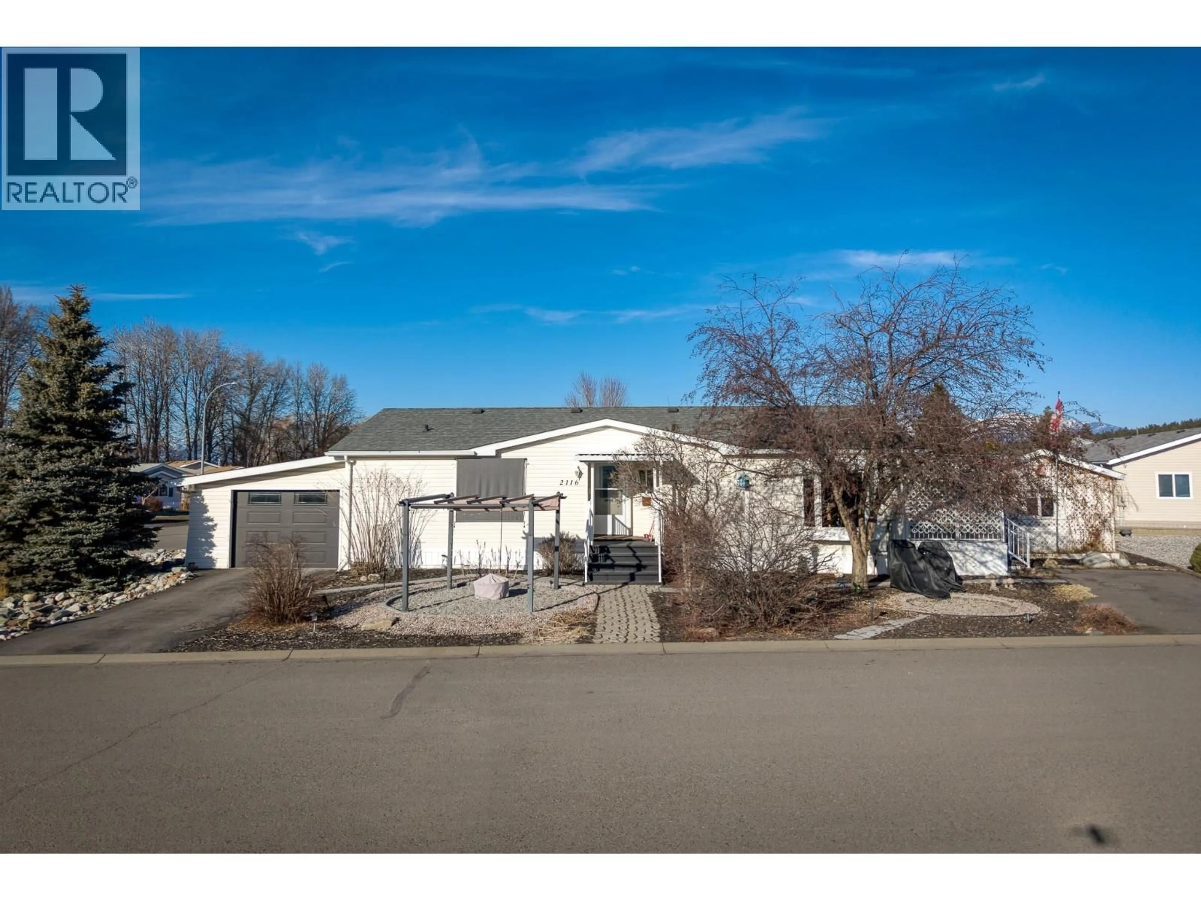 A pic from outside/outdoor area/front of a property/back of a property/a pic from drone, street for 2116 KOKANEE  N COURT, Cranbrook British Columbia V1C6N7