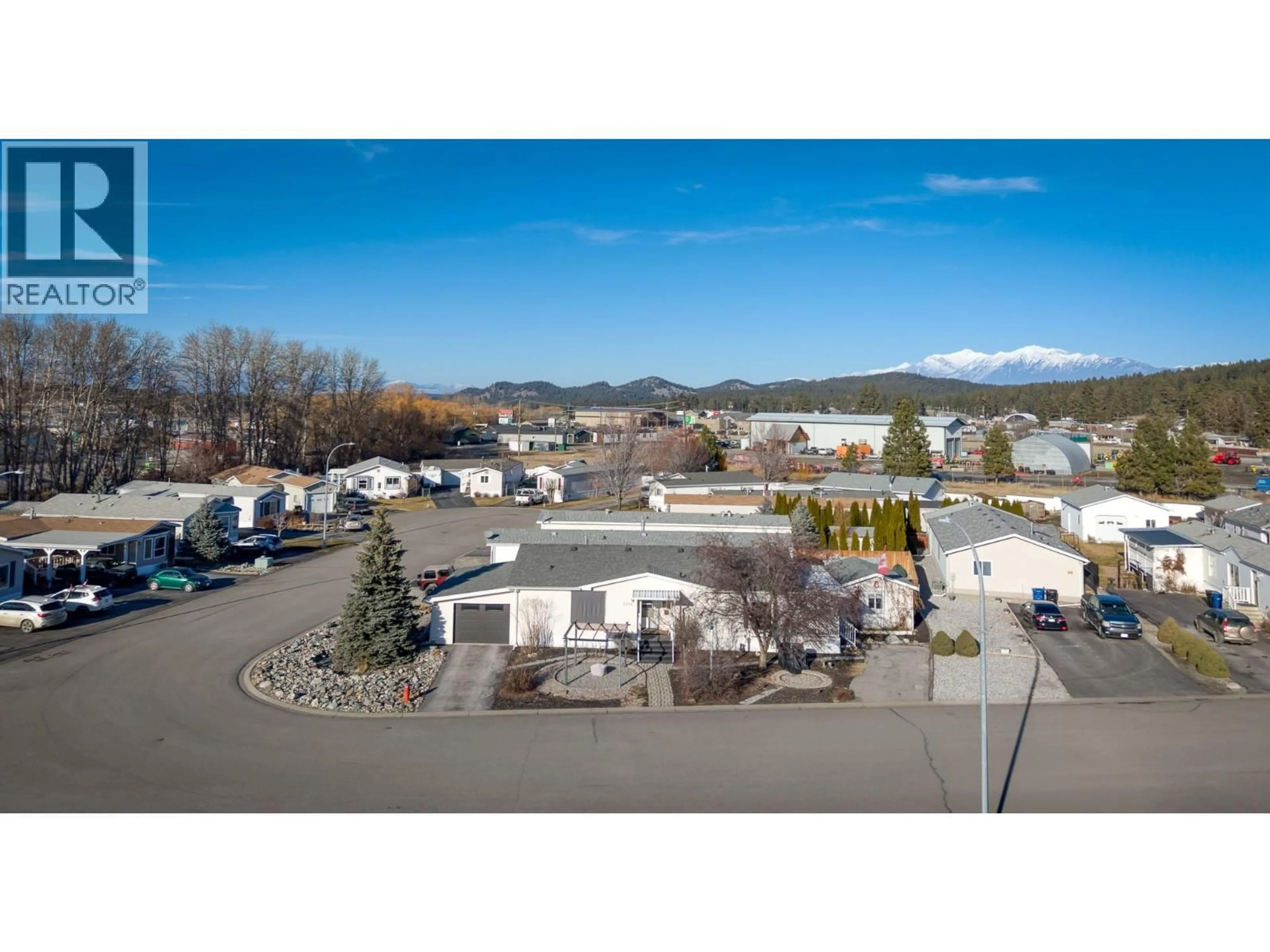 A pic from outside/outdoor area/front of a property/back of a property/a pic from drone, mountain view for 2116 KOKANEE  N COURT, Cranbrook British Columbia V1C6N7