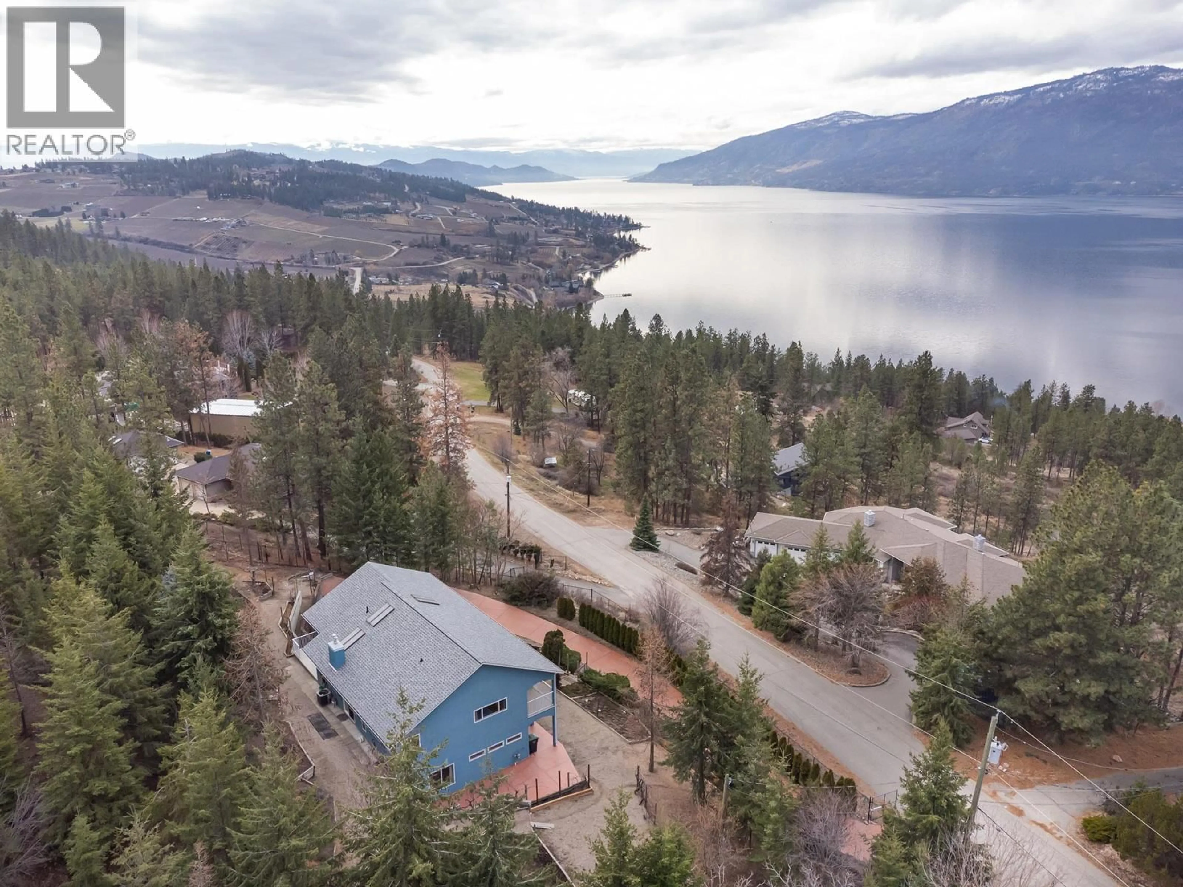 A pic from outside/outdoor area/front of a property/back of a property/a pic from drone, water/lake/river/ocean view for 14141 MOBERLY ROAD, Lake Country British Columbia V4V1A6