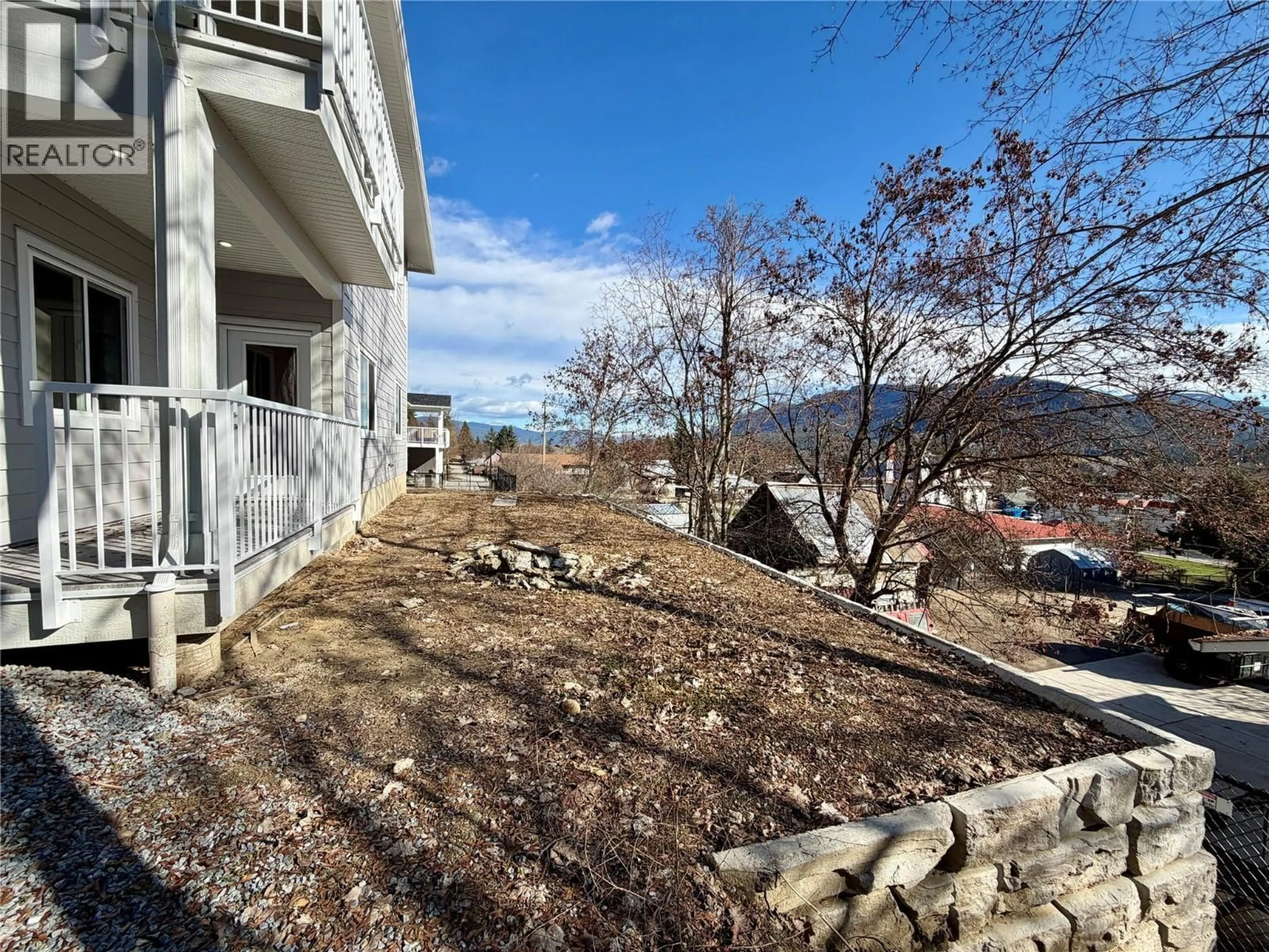 A pic from outside/outdoor area/front of a property/back of a property/a pic from drone, mountain view for 103 - 806 CLIFF AVENUE, Enderby British Columbia V0E1V1