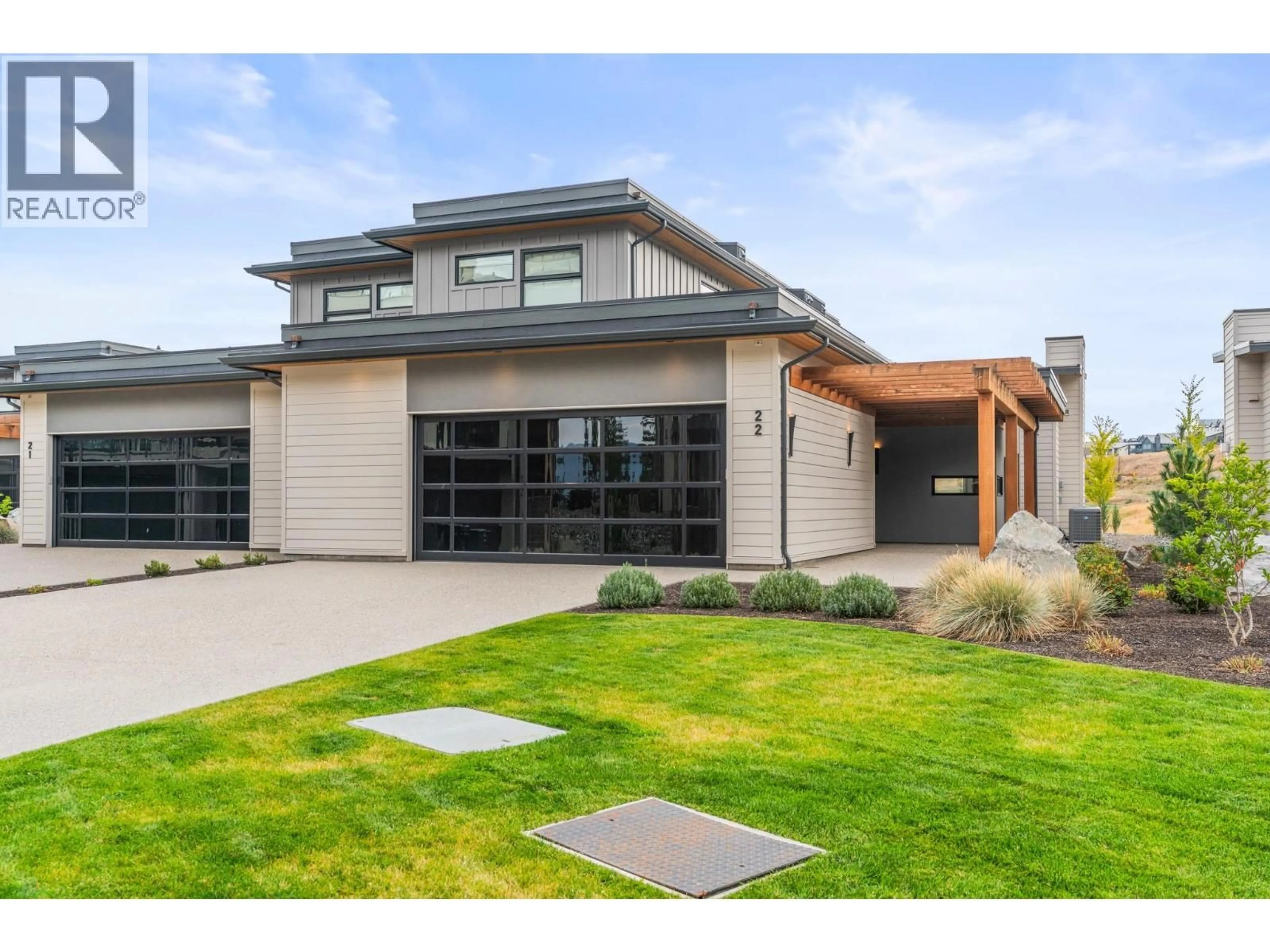 Home with brick exterior material, street for 22 - 105 PREDATOR RIDGE DRIVE, Vernon British Columbia V1H0A5