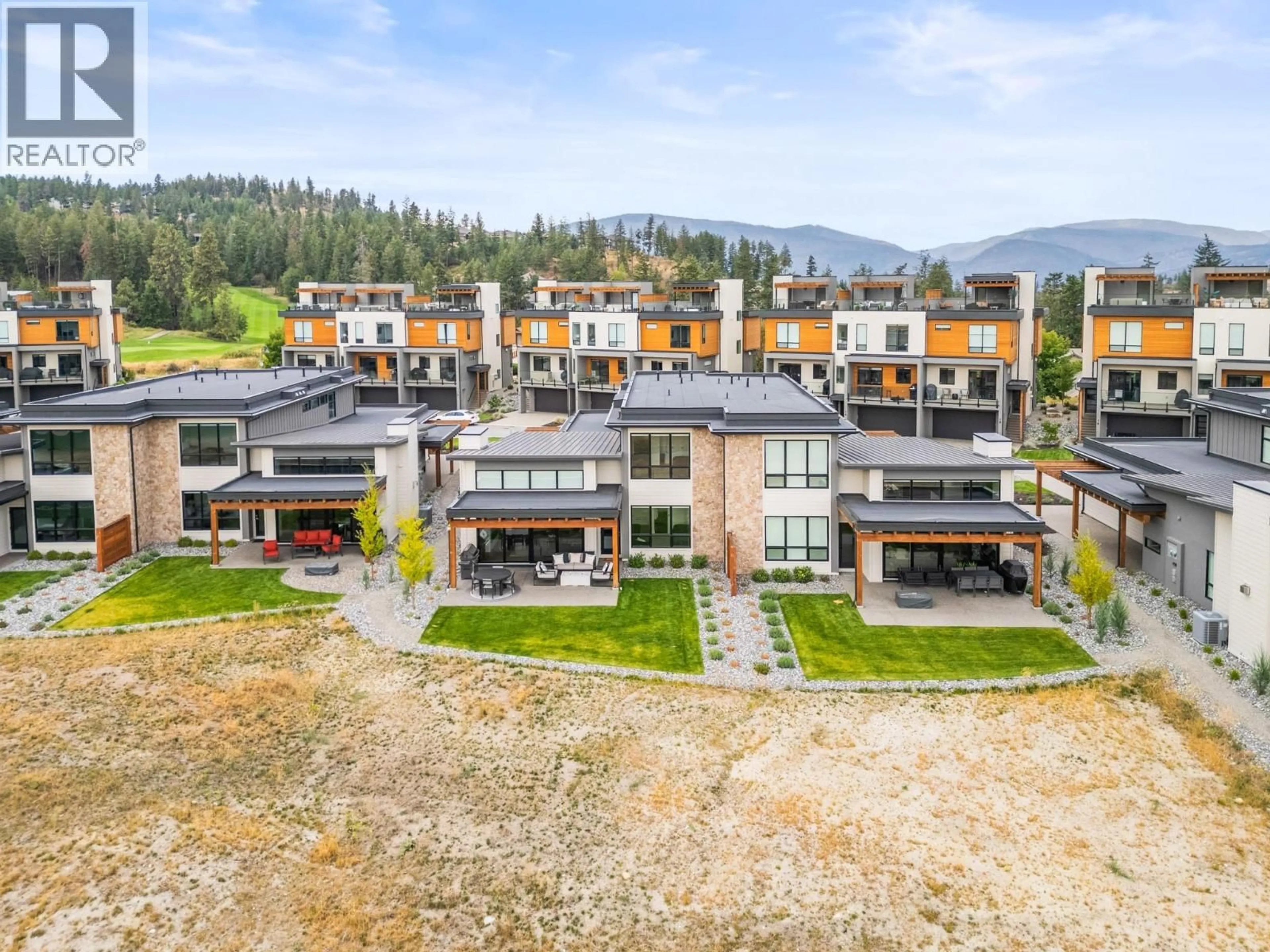 A pic from outside/outdoor area/front of a property/back of a property/a pic from drone, mountain view for 22 - 105 PREDATOR RIDGE DRIVE, Vernon British Columbia V1H0A5