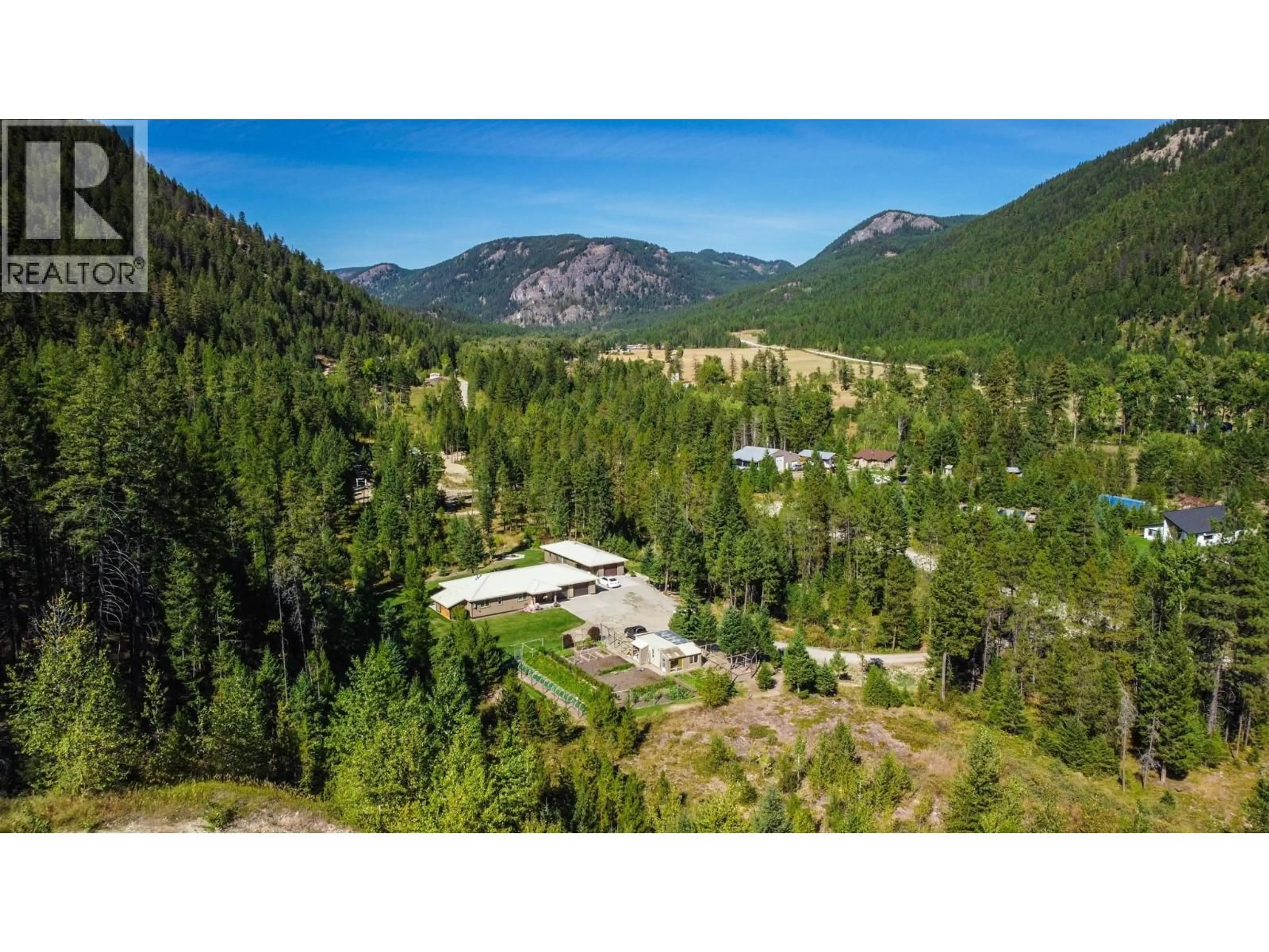 A pic from outside/outdoor area/front of a property/back of a property/a pic from drone, mountain view for 3437 BLYTHE-RHONE ROAD, Westbridge British Columbia V0H1Y0
