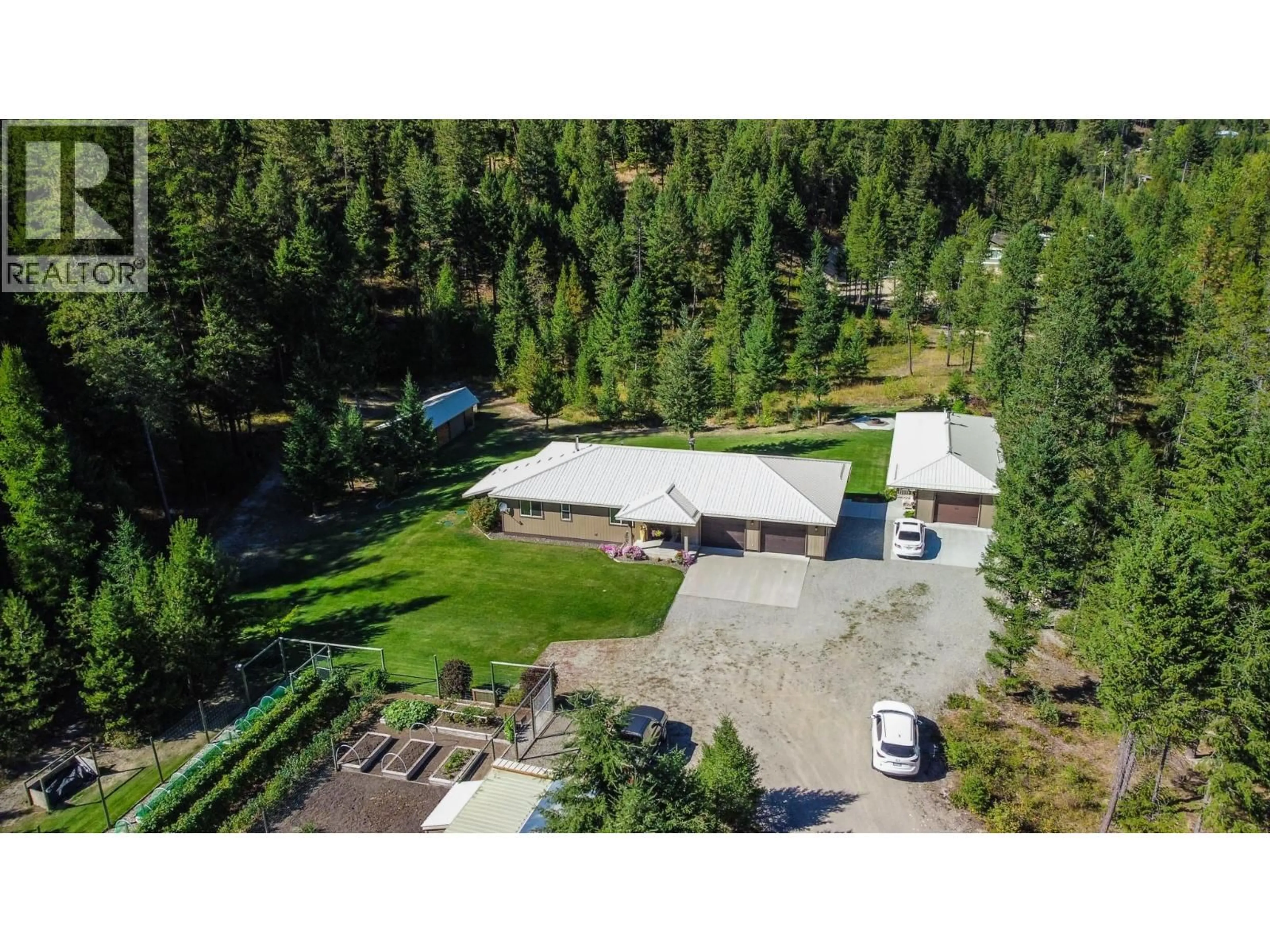 A pic from outside/outdoor area/front of a property/back of a property/a pic from drone, mountain view for 3437 BLYTHE-RHONE ROAD, Westbridge British Columbia V0H1Y0