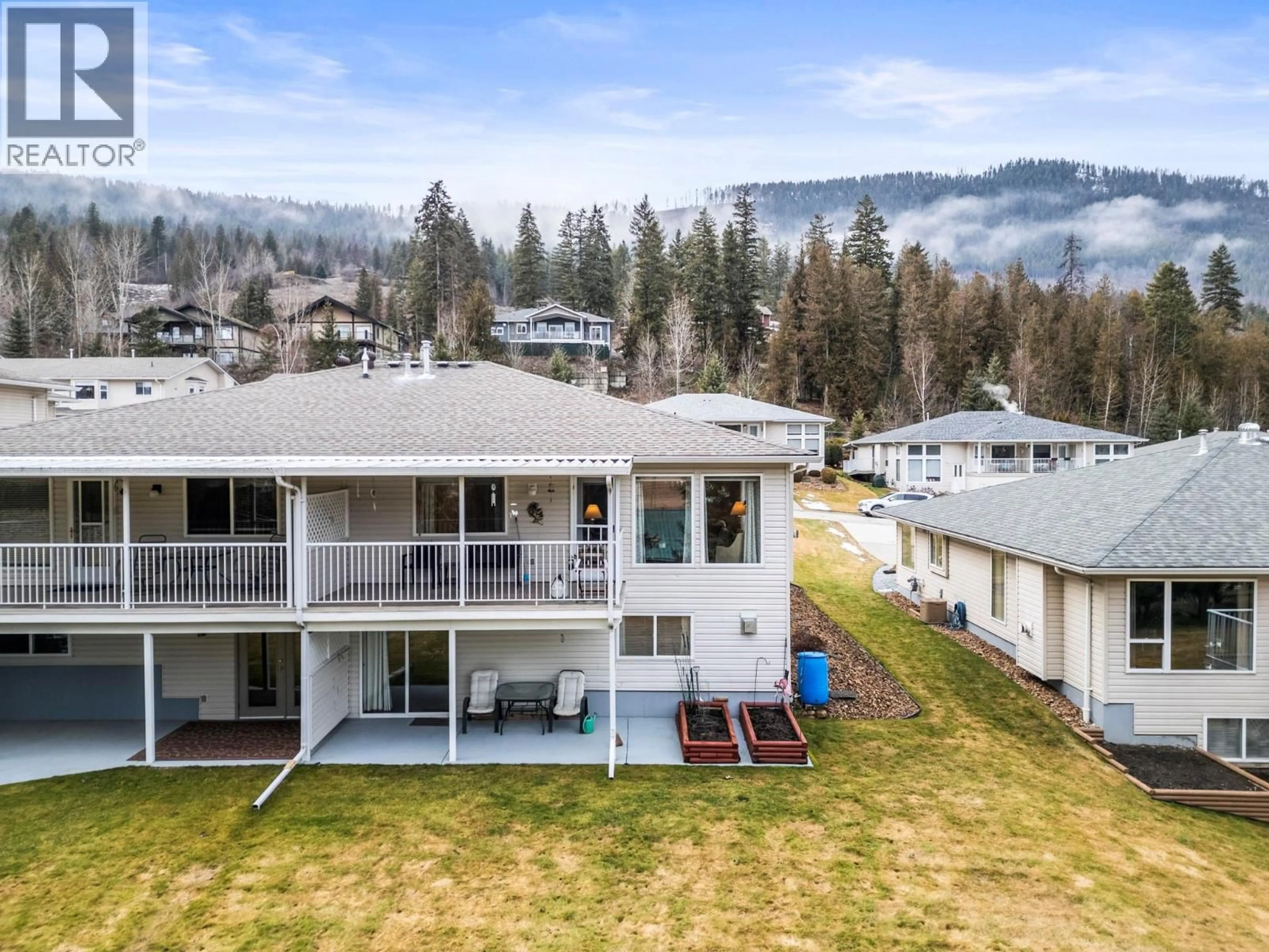 A pic from outside/outdoor area/front of a property/back of a property/a pic from drone, mountain view for 54 - 2675 PINE AVENUE, Lumby British Columbia V0E2G5
