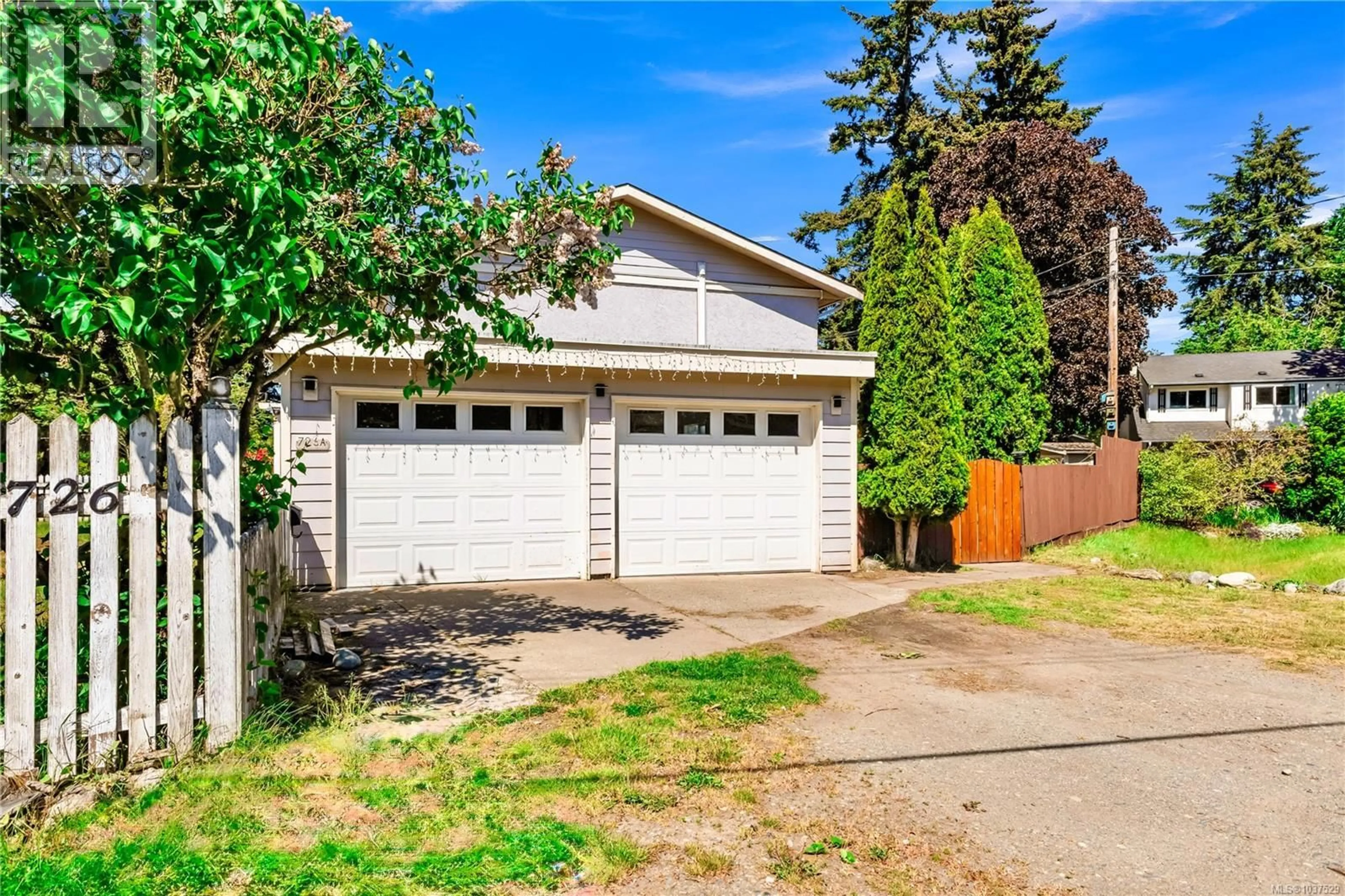 Home with vinyl exterior material, street for 726A KELLY ROAD, Colwood British Columbia V9B2A9