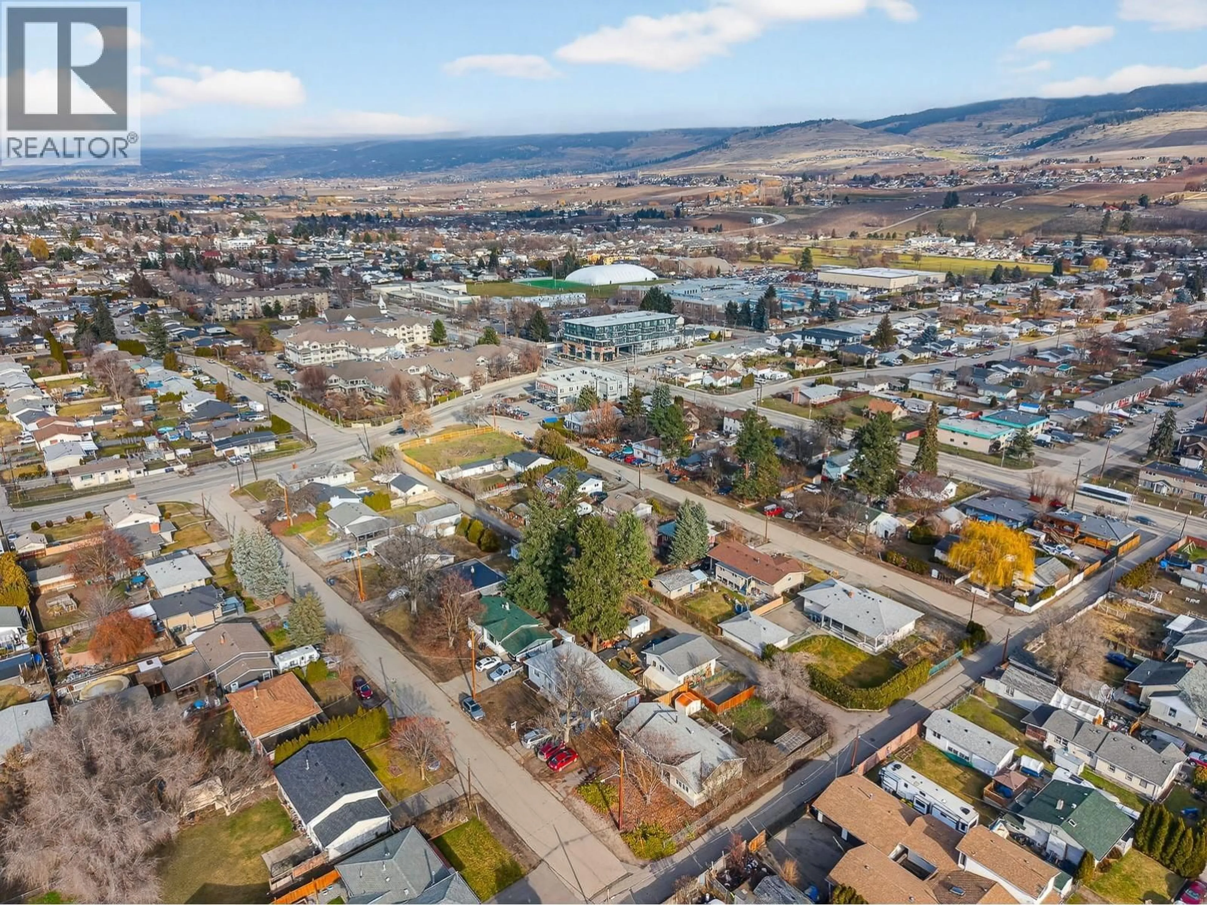 A pic from outside/outdoor area/front of a property/back of a property/a pic from drone, street for 505 DONHAUSER ROAD, Kelowna British Columbia V1X3G2